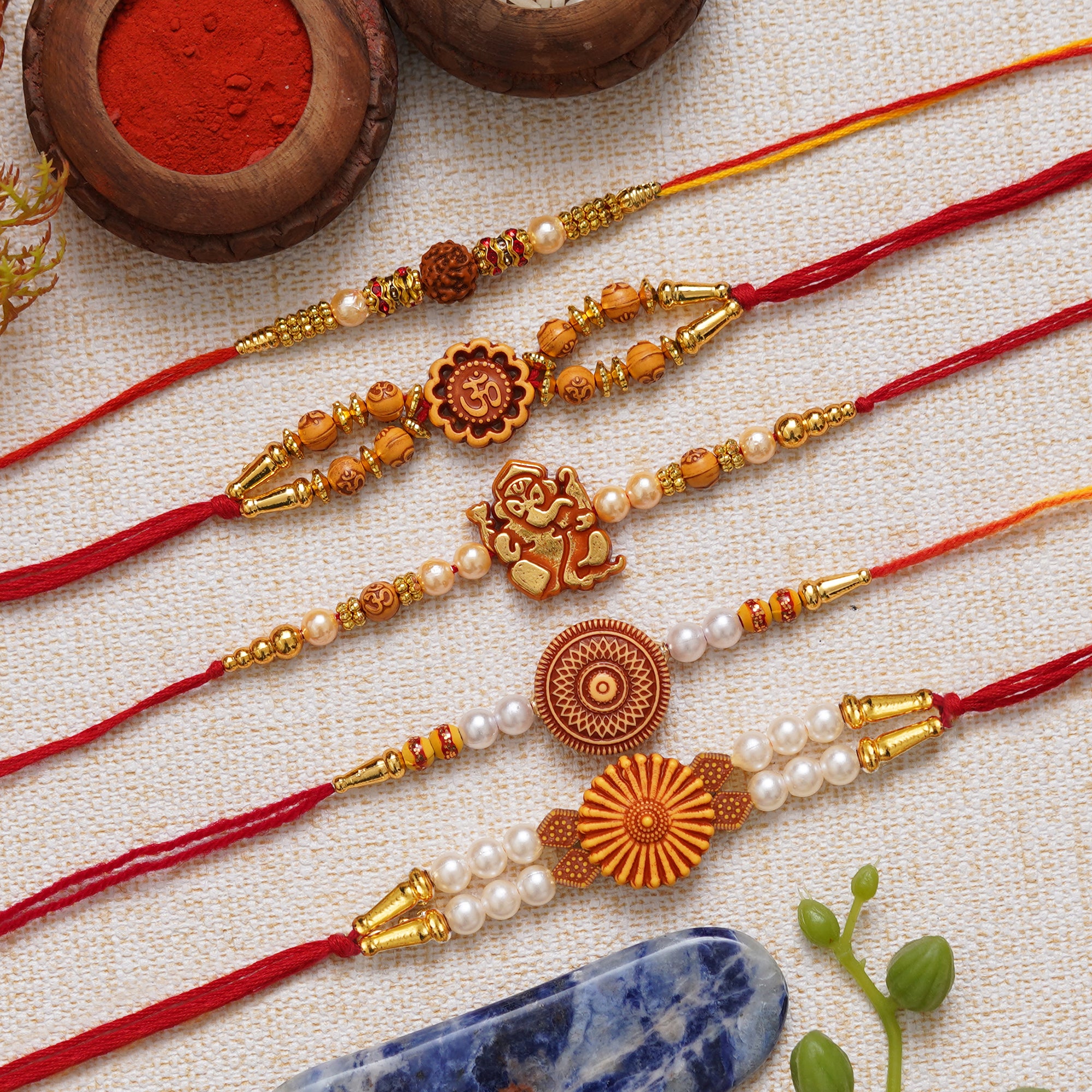 eCraftIndia Multicolor Set of 5 Rudraksha, Om, Ganesha, Flower, Pearls Religious Designer Rakhis with Roli Chawal Pack