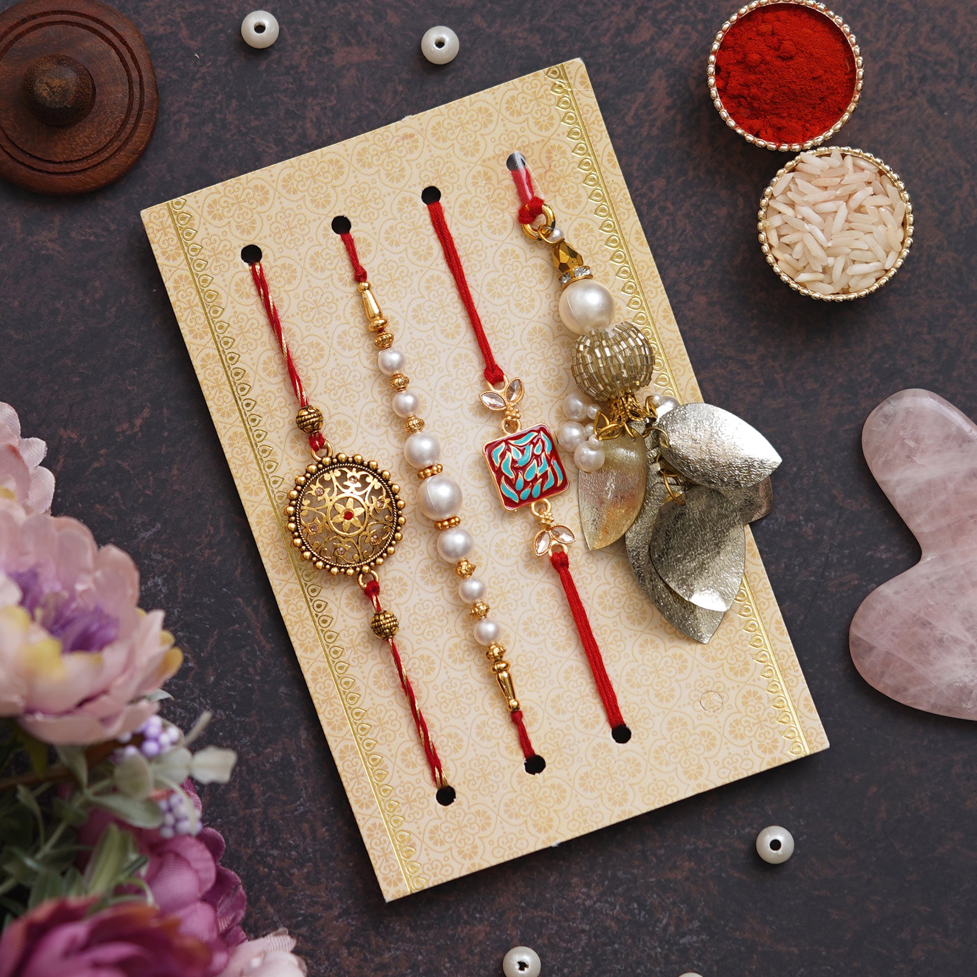 Set of 4 Floral, Pearls, Diamonds, Lumba Designer Rakhis with Radha Krishna Idol Diya and Roli Chawal Pack, Raksha Bandhan Greeting Card 1