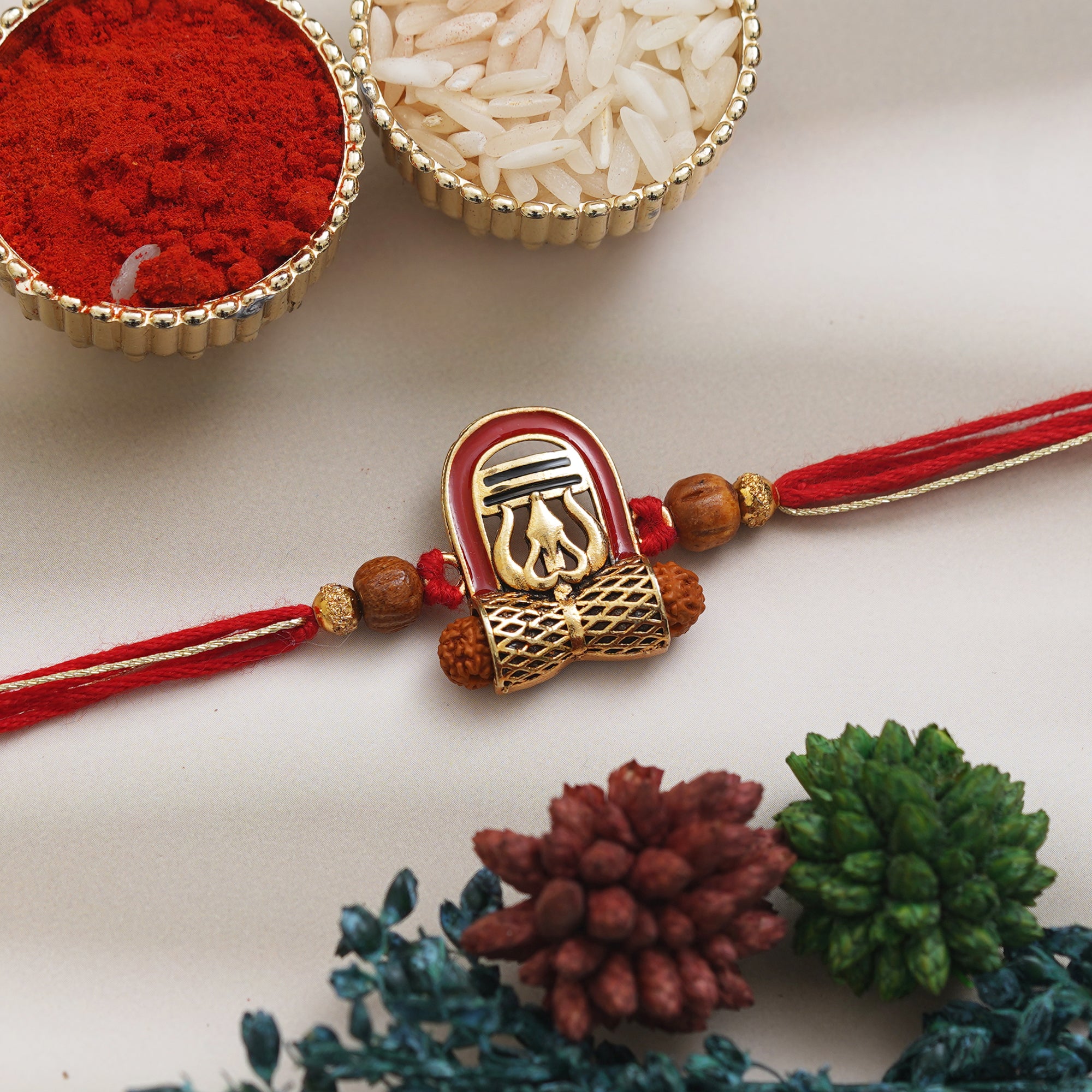 Red, Brown, and Golden Lord Shiva Shivling, Trishul, Damru, and Rudraksha Religious Designer Rakhi, and Roli Chawal Pack