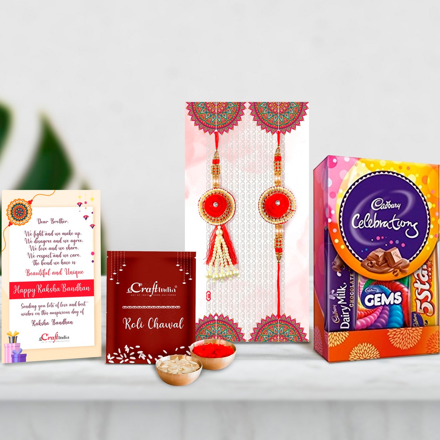 Bhaiya Bhabhi Rakhi Set with Cadbury Celebrations Gift Pack of 5 Assorted Chocolates and Roli Chawal Pack, Best Wishes Greeting Card