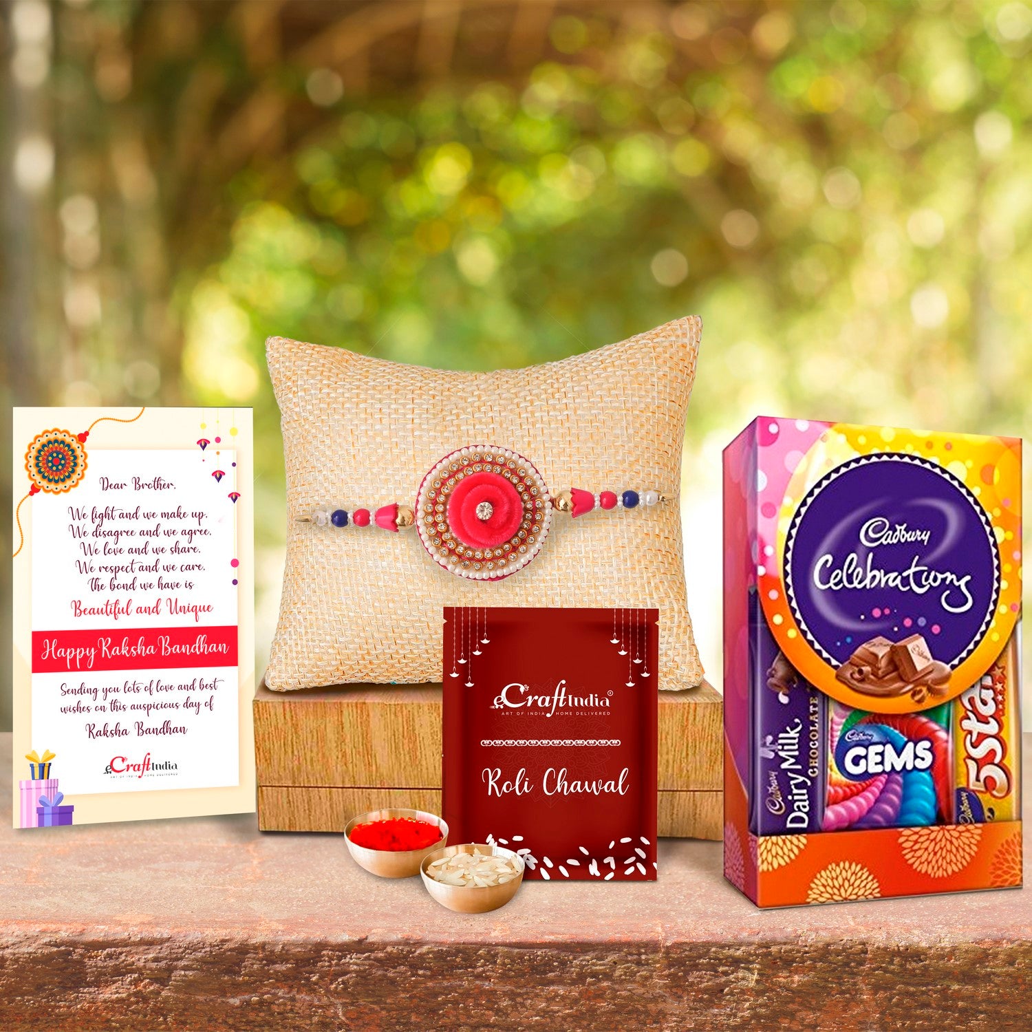 Designer Rakhi with Cadbury Celebrations Gift Pack of 5 Assorted Chocolates and Roli Chawal Pack, Best Wishes Greeting Card