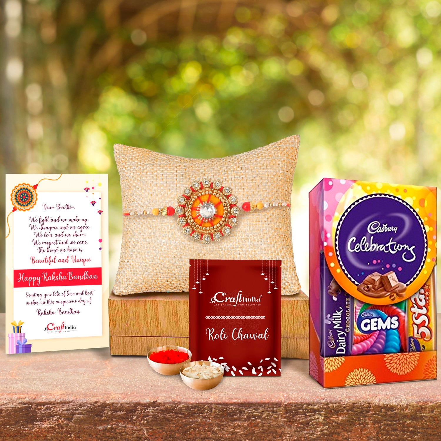 Designer Rakhi with Cadbury Celebrations Gift Pack of 5 Assorted Chocolates and Roli Chawal Pack, Best Wishes Greeting Card