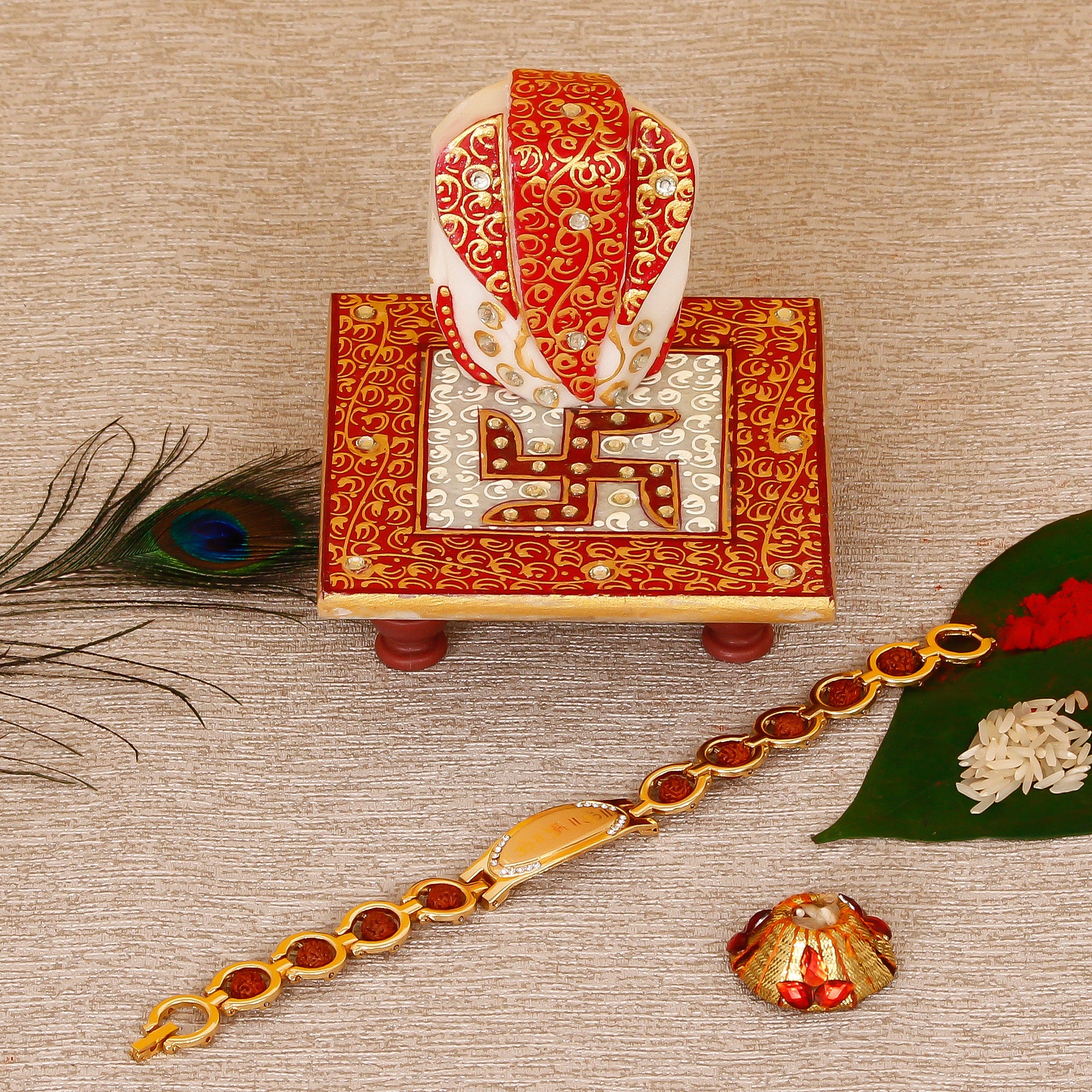 Designer Bracelet Religious Rakhi with Ridhi Sidhi Marble chowki and Roli Tikka Matki