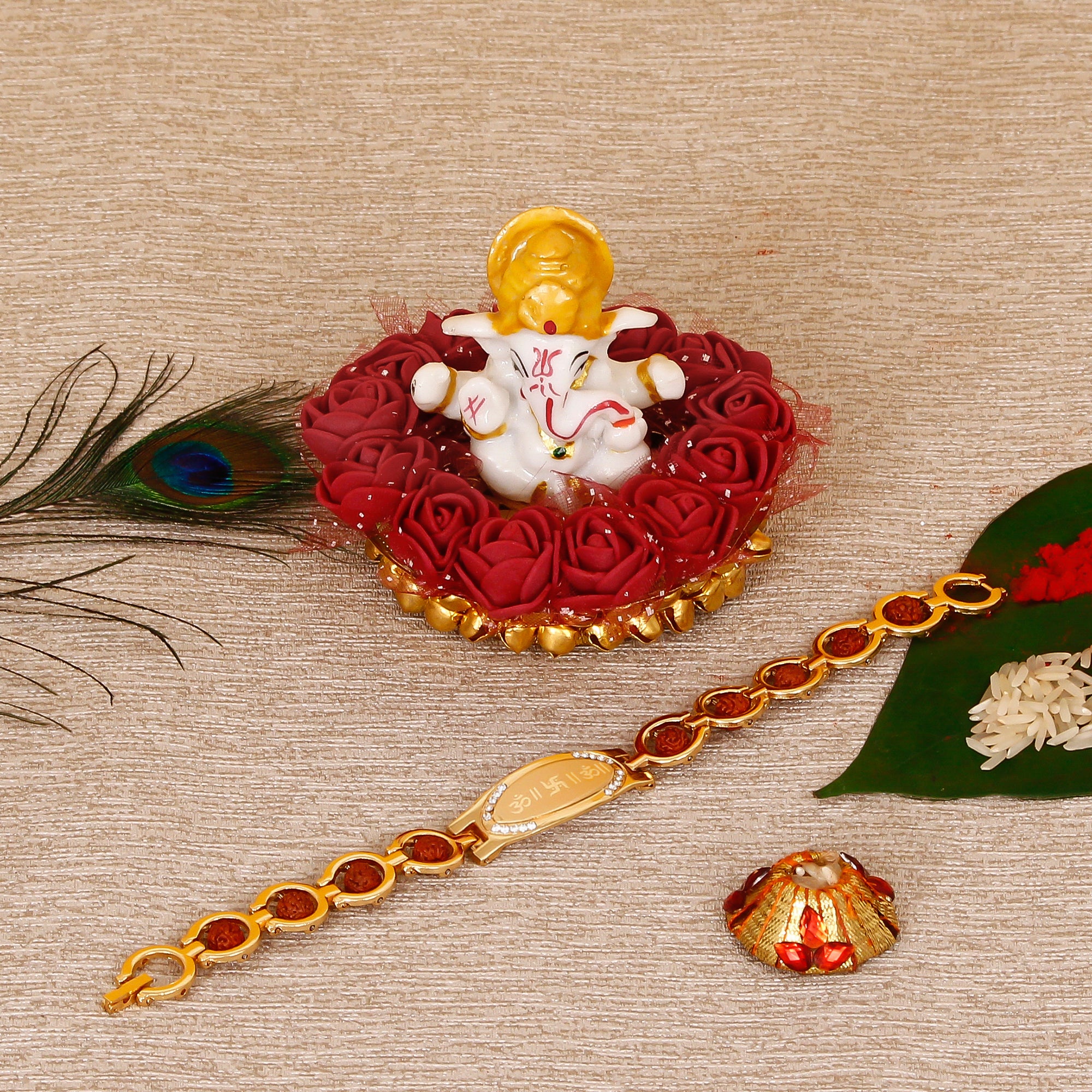 Designer Bracelet Religious Rakhi with Lord Ganesha Idol on Decorative Plate for Car & Home and Roli Tikka Matki