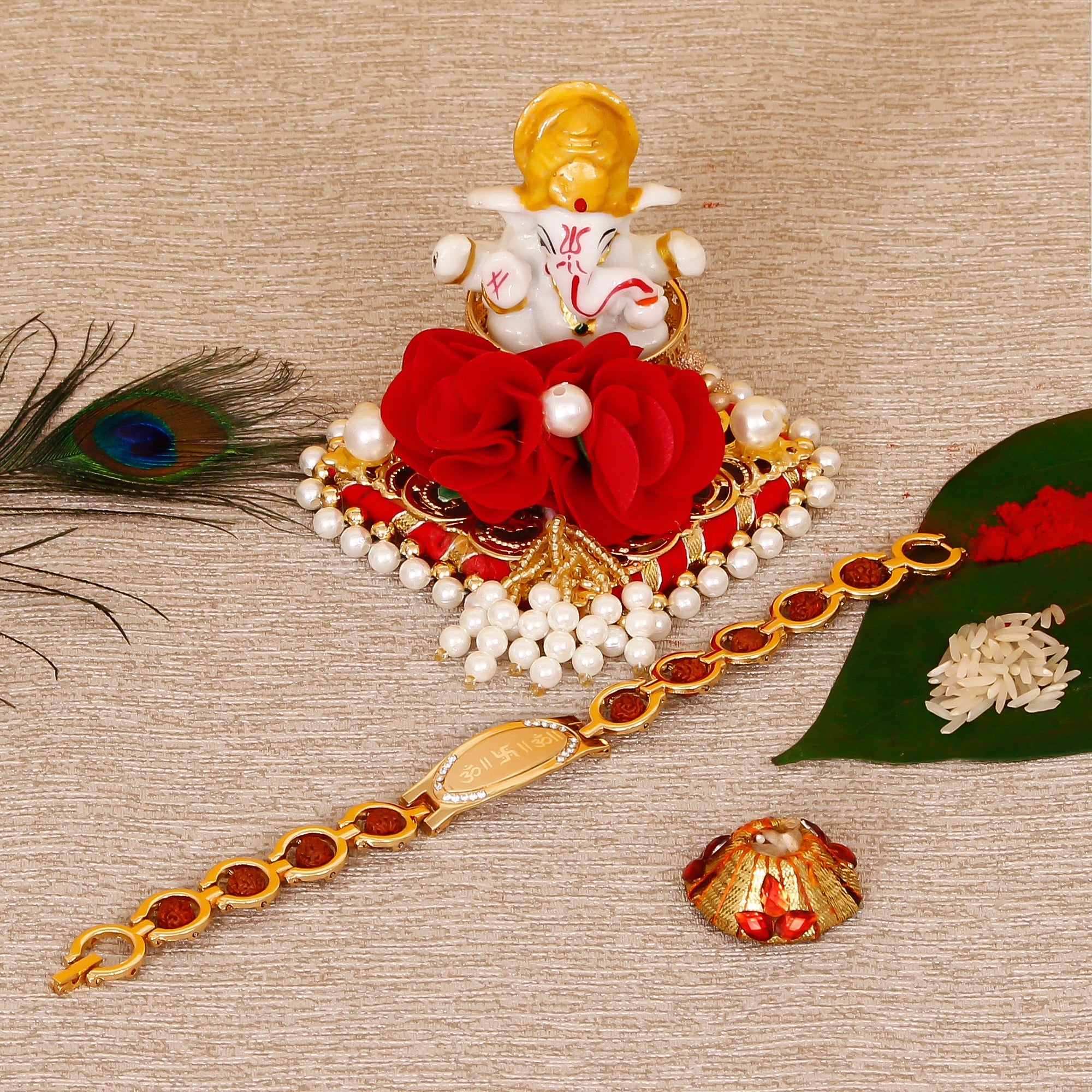 Designer Bracelet Religious Rakhi with Lord Ganesha Idol on Decorative Plate for Car & Home and Roli Tikka Matki
