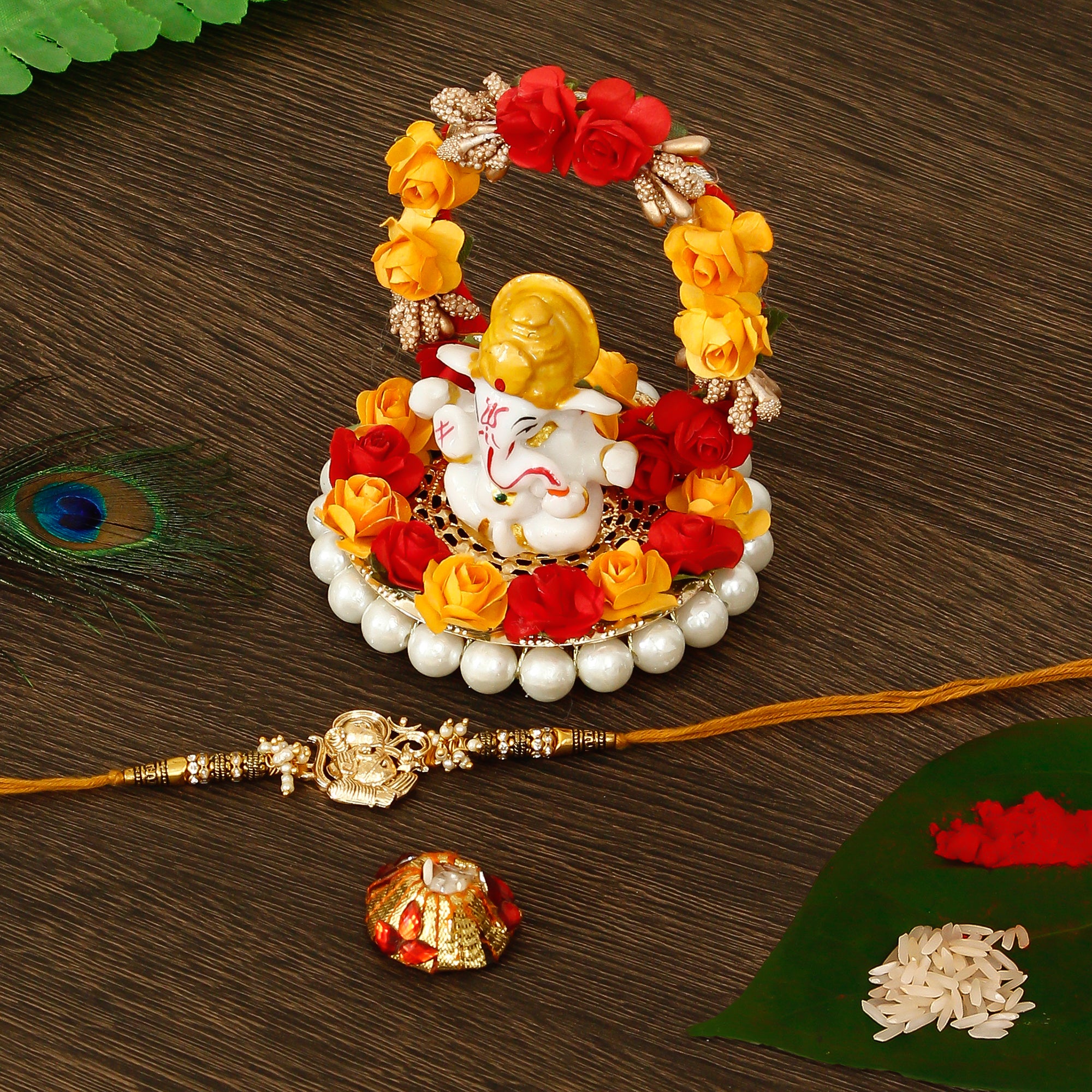 Designer Ganesha Rakhi with Lord Ganesha Idol on Decorative Plate for Car & Home and Roli Tikka Matki