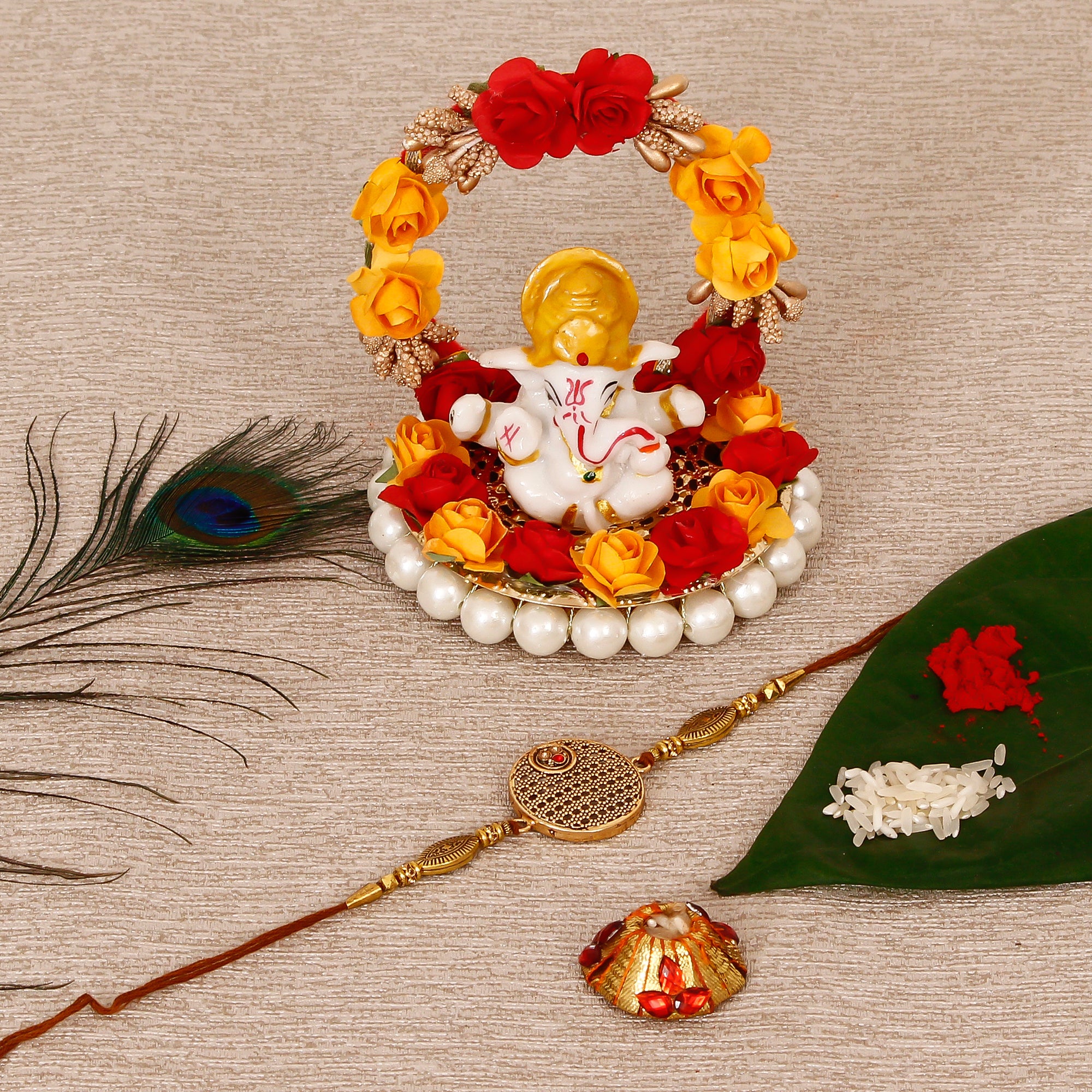 Designer Rakhi with Lord Ganesha Idol on Decorative Plate for Car & Home and Roli Tikka Matki