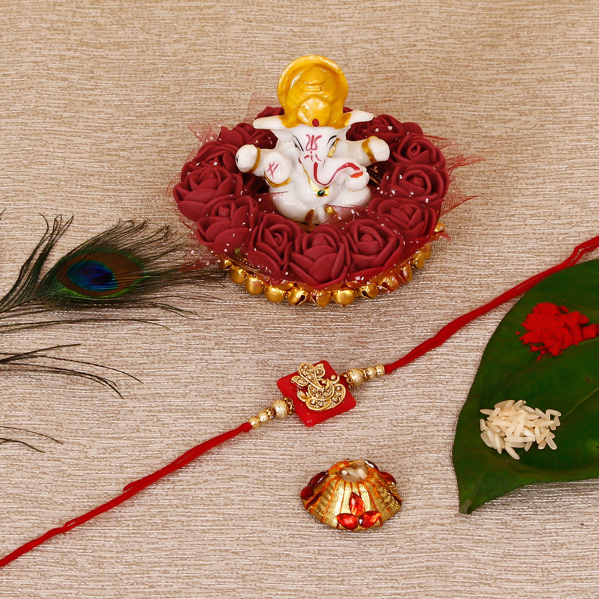 Designer Religious Ganesha Rakhi with Lord Ganesha Idol on Decorative Plate for Car & Home and Roli Tikka Matki