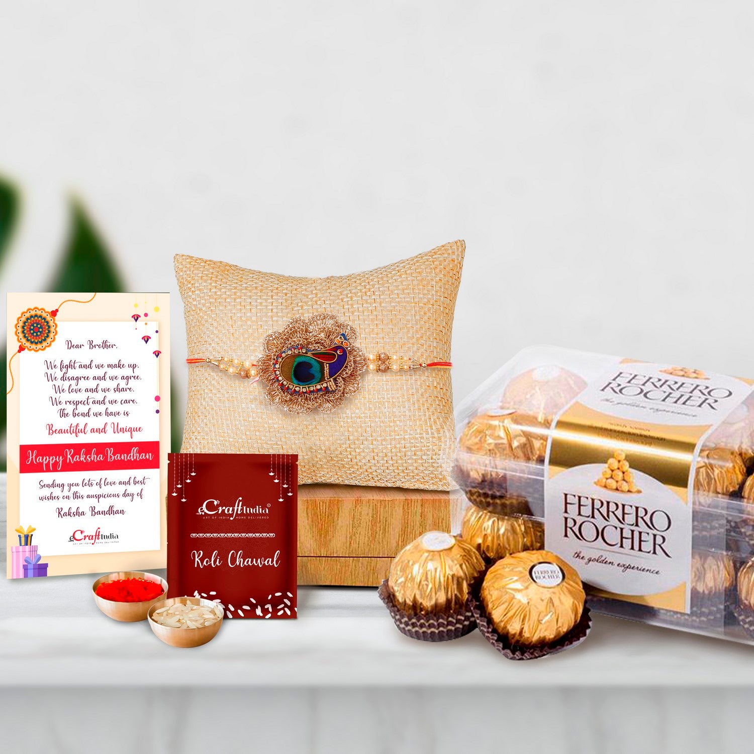 Designer Peacock Rakhi with Ferrero Rocher (16 pcs) and Roli Chawal Pack, Best Wishes Greeting Card