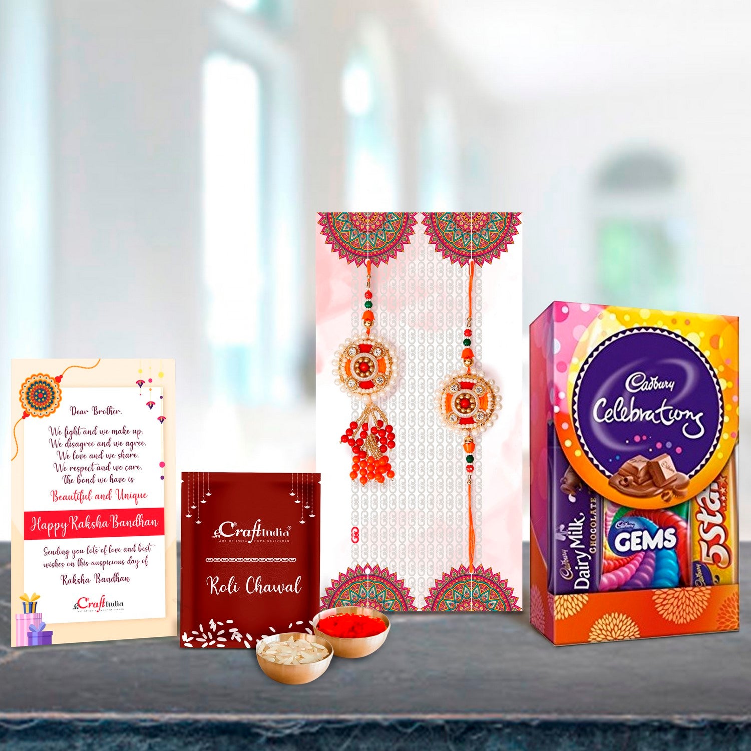 Designer Bhaiya Bhabhi Rakhi with Cadbury Celebrations Gift Pack of 5 Assorted Chocolates and Roli Chawal Pack, Best Wishes Greeting Card