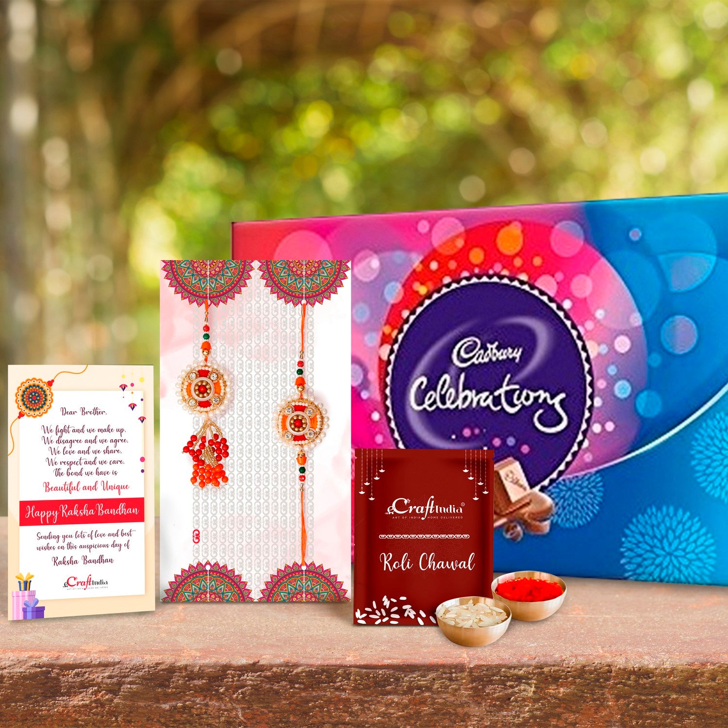 Designer Bhaiya Bhabhi Rakhi with Cadbury Celebrations Gift Pack of 7 Assorted Chocolates and Roli Chawal Pack, Best Wishes Greeting Card
