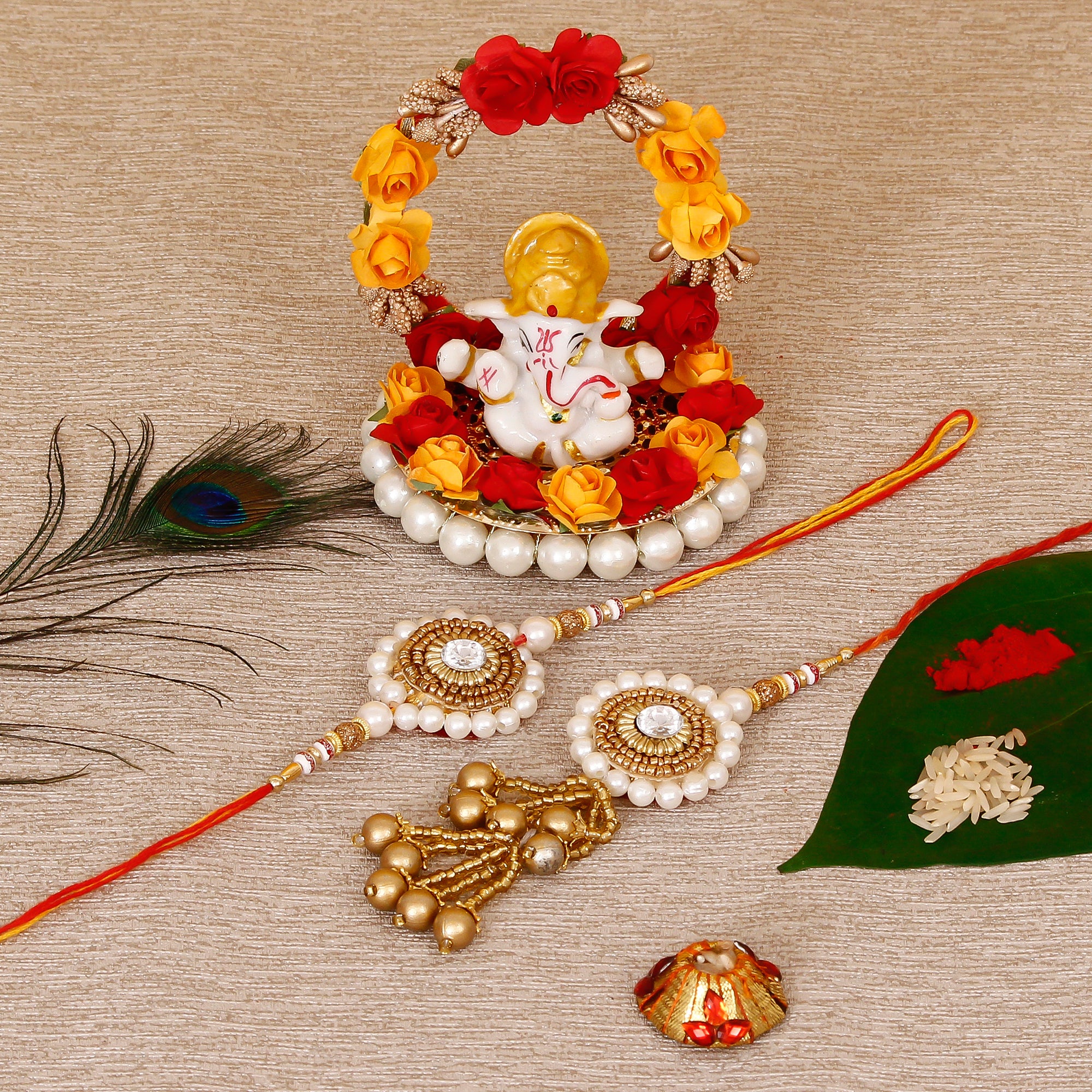 Designer Bhaiya Bhabhi Rakhi with Lord Ganesha Idol on Decorative Plate for Car & Home and Roli Tikka Matki