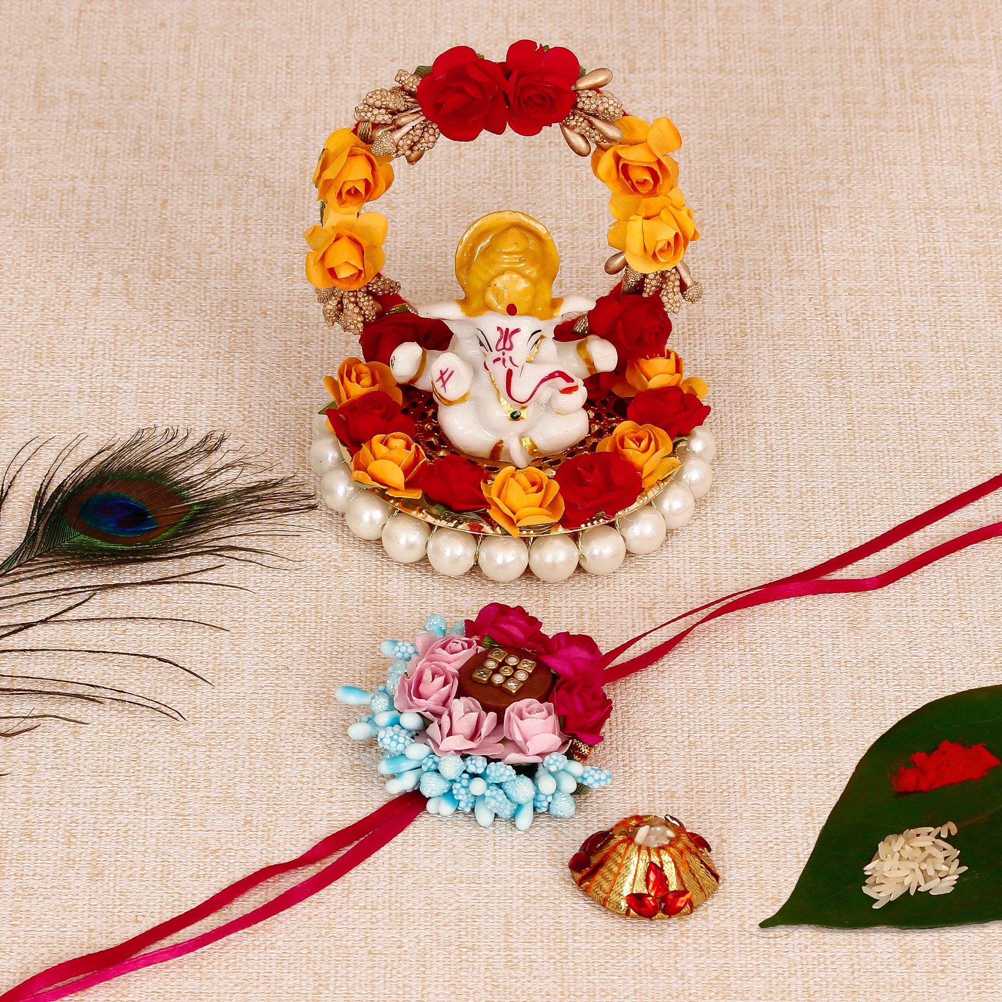 Designer Floral Rakhi with Lord Ganesha Idol on Decorative Plate for Car & Home and Roli Tikka Matki