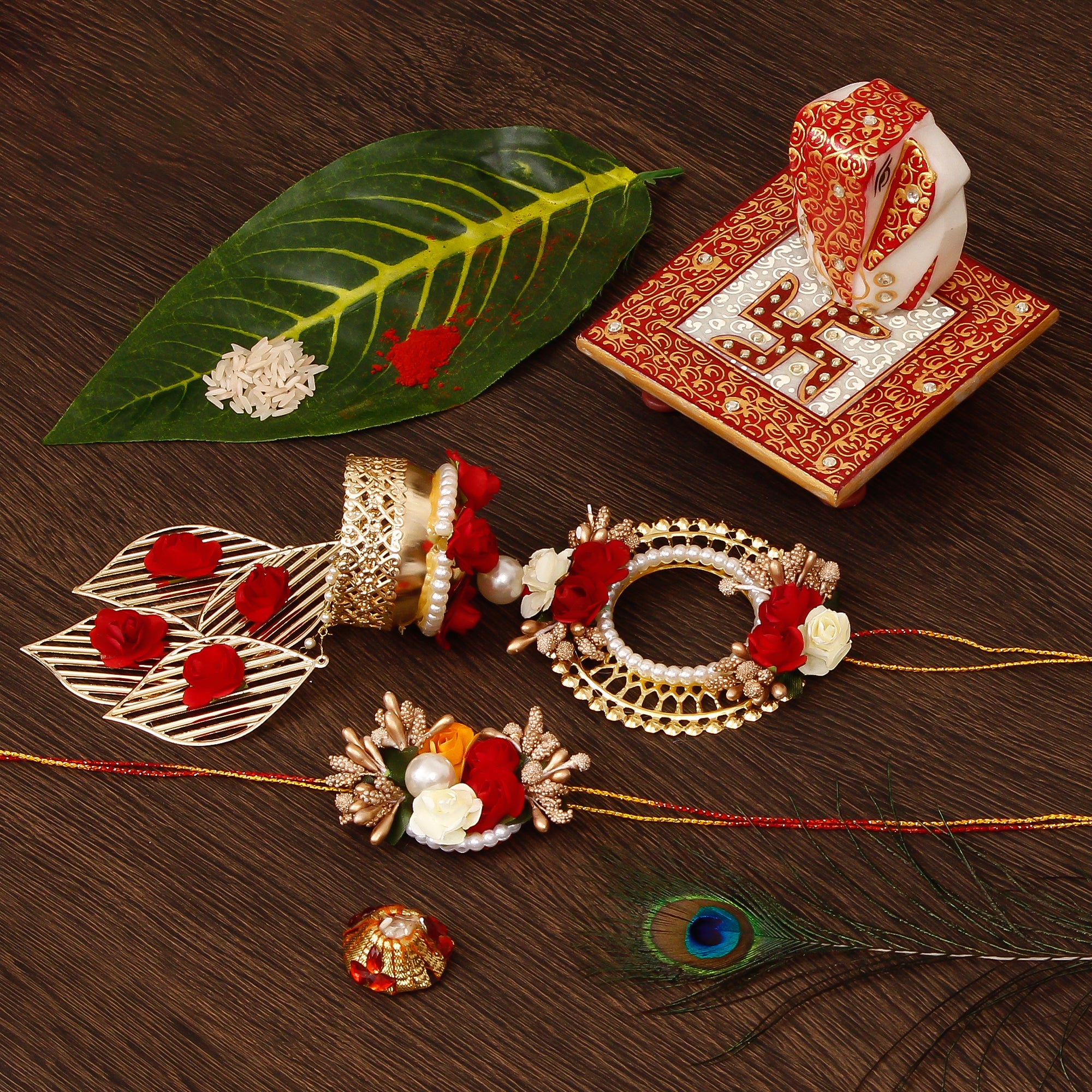Designer Handcrafted Bhaiya Bhabhi Rakhi with Ridhi Sidhi Marble chowki and Roli Tikka Matki