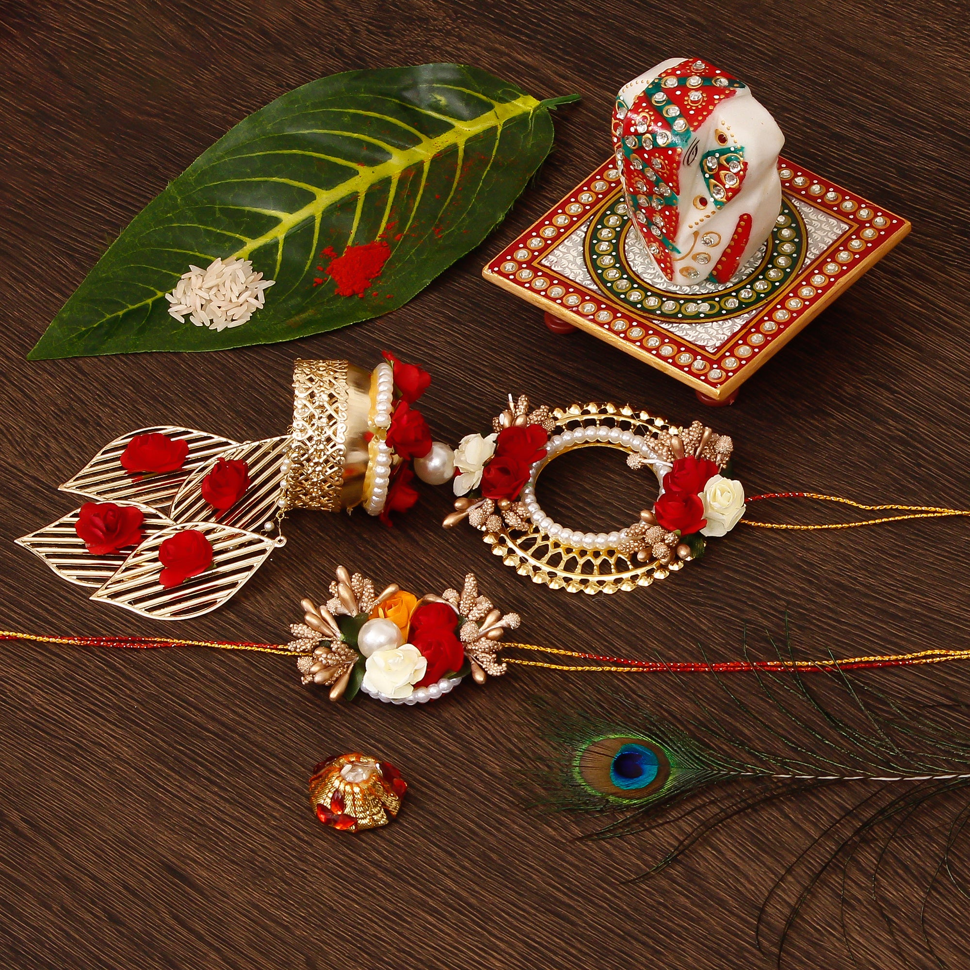 Designer Handcrafted Bhaiya Bhabhi Rakhi with Lord Ganesha on Kundan Studded Marble Chowki and Roli Tikka Matki