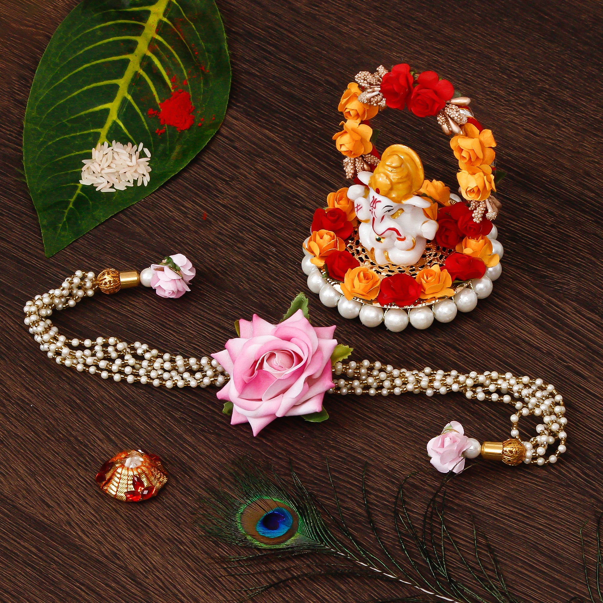 Floral Rakhi for Bhabhi with Lord Ganesha Idol on Decorative Plate for Car & Home and Roli Tikka Matki
