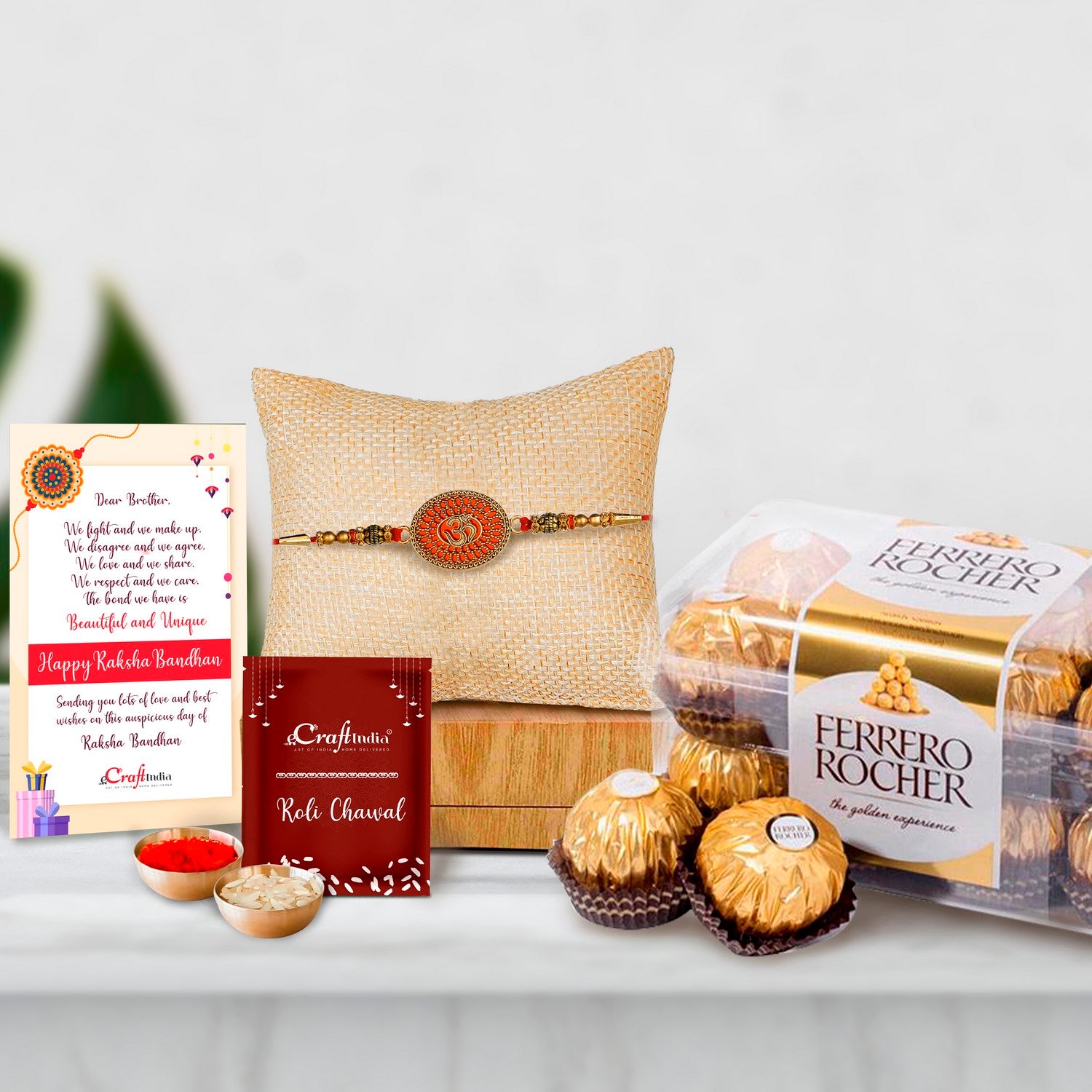 Designer Om Rakhi with Ferrero Rocher (16 pcs) and Roli Chawal Pack, Best Wishes Greeting Card