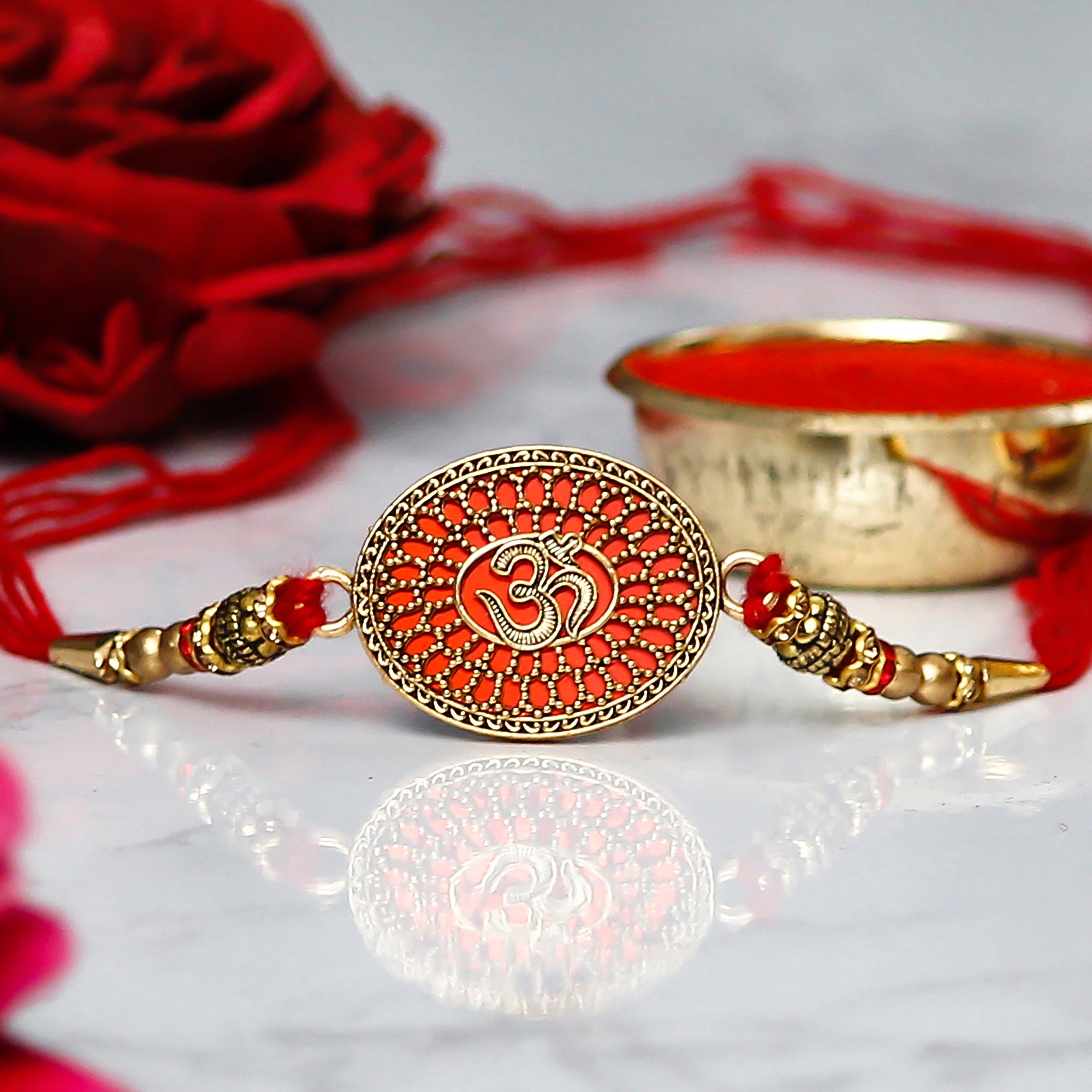 Designer Om Rakhi with Lord Ganesha on Marble Chowki and Roli Chawal Pack 1