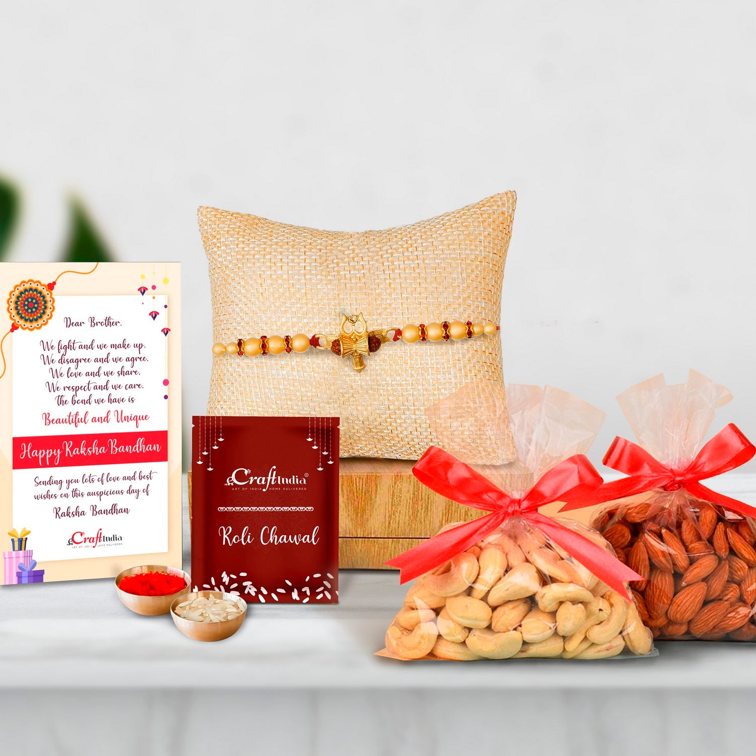 Designer Ganesha Rakhi with Badam and Cashew (200 gm each, total 400 gm) and Roli Chawal Pack, Best Wishes Greeting Card
