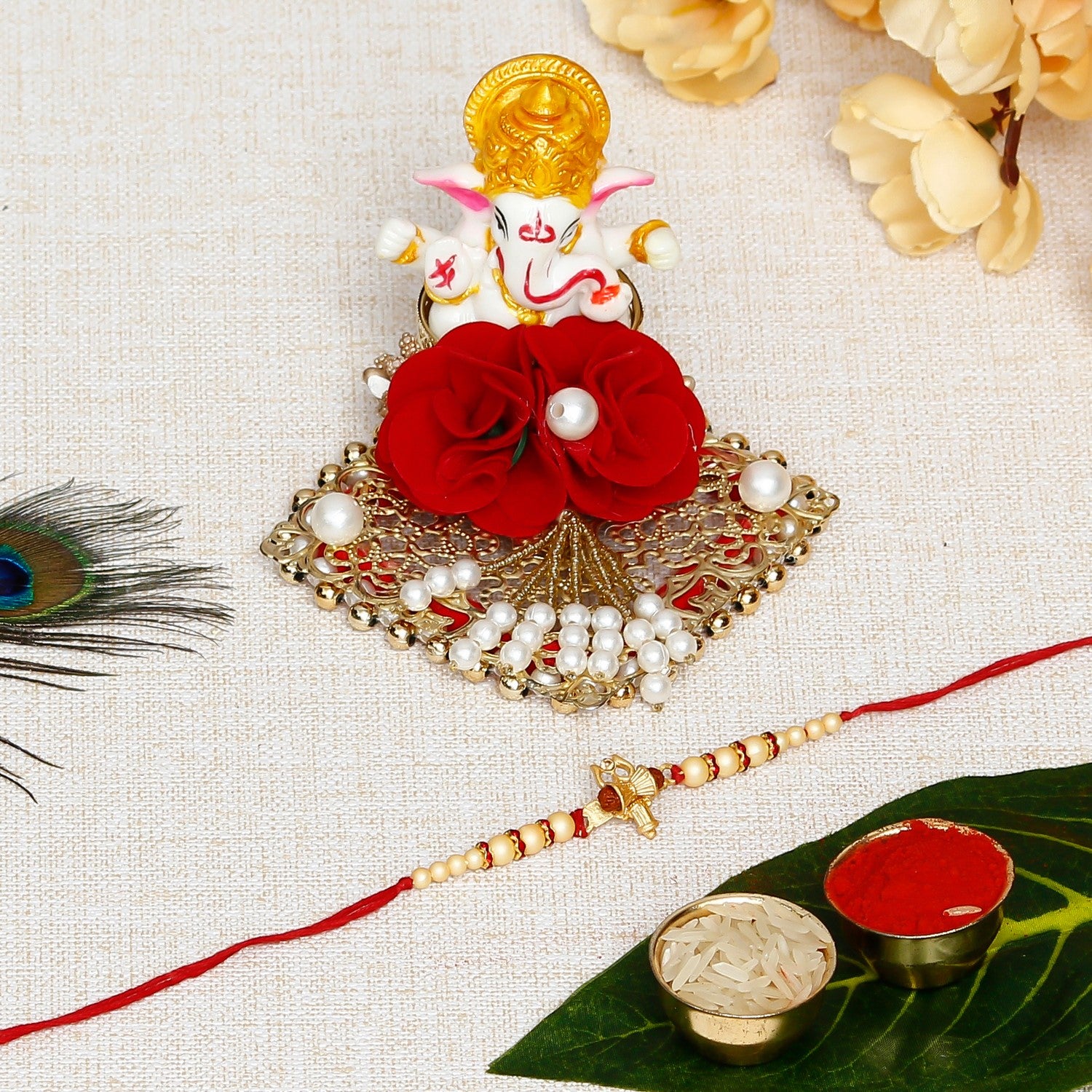 Designer Ganesha Rakhi with Lord Ganesha Idol on Decorative Plate for Car & Home and Roli Chawal Pack