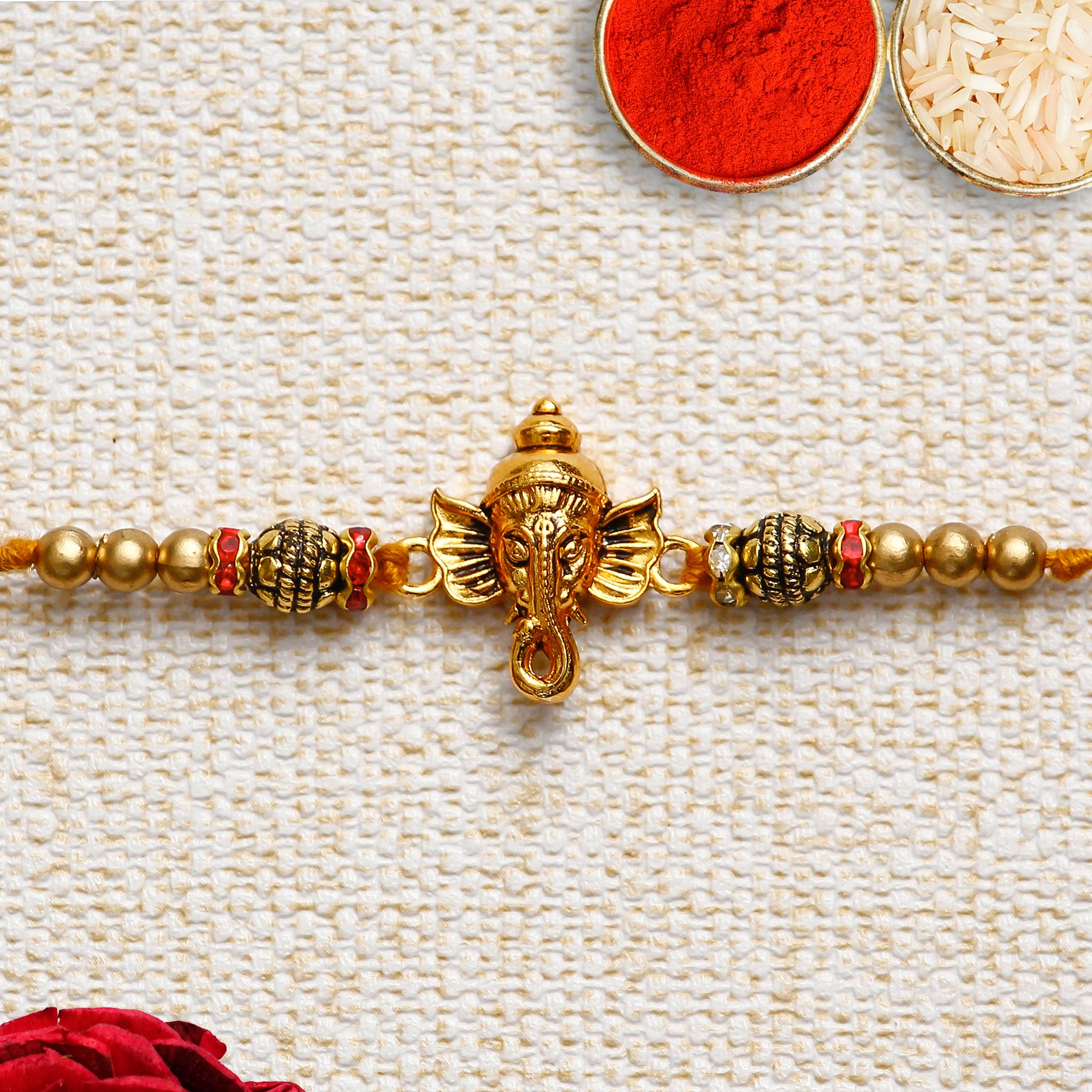 Designer Ganesha Rakhi with Lord Ganesha Marble Chowki and Roli Chawal Pack 1