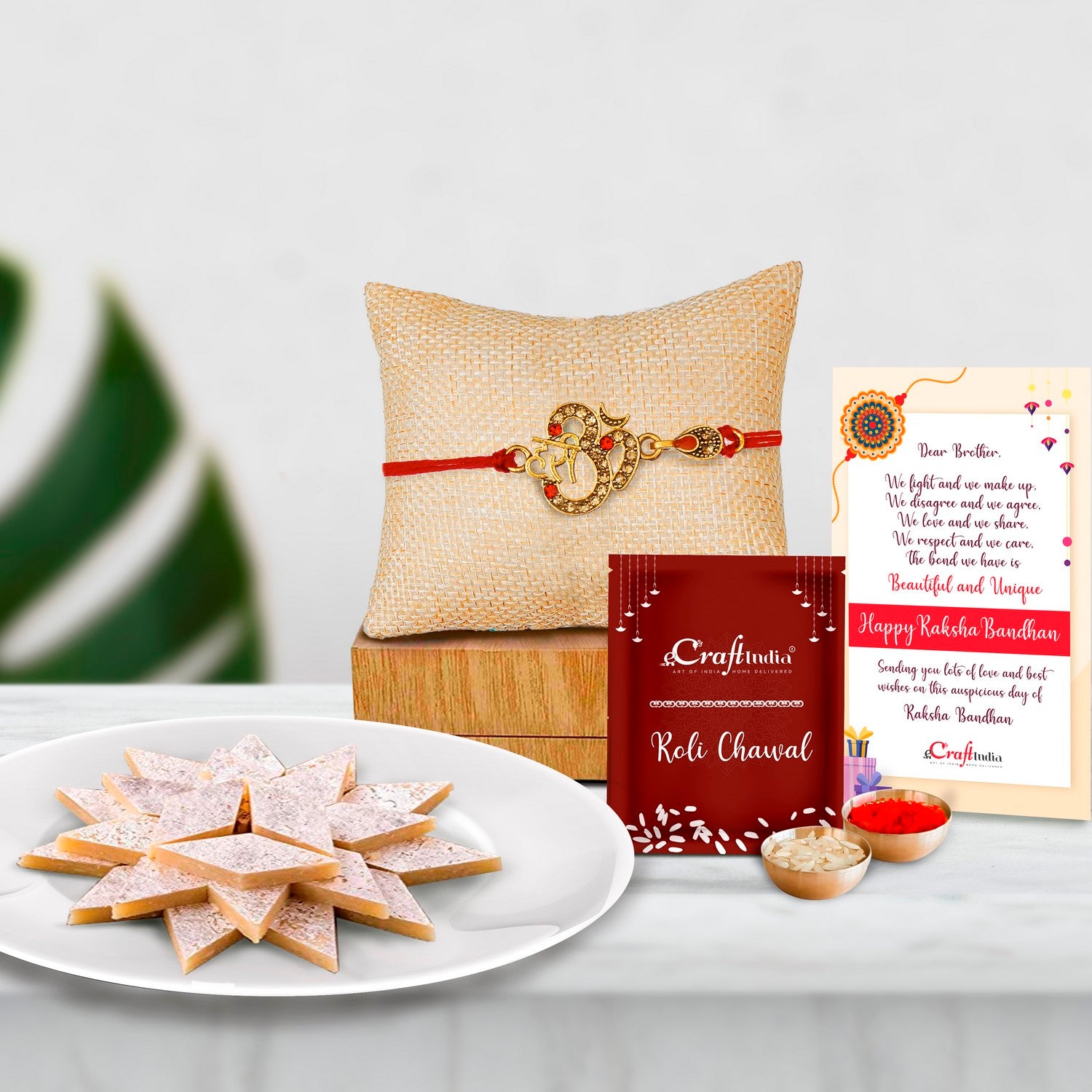 Designer Om Rakhi with Kaju Katli (500 Gm) and Roli Chawal Pack, Best Wishes Greeting Card