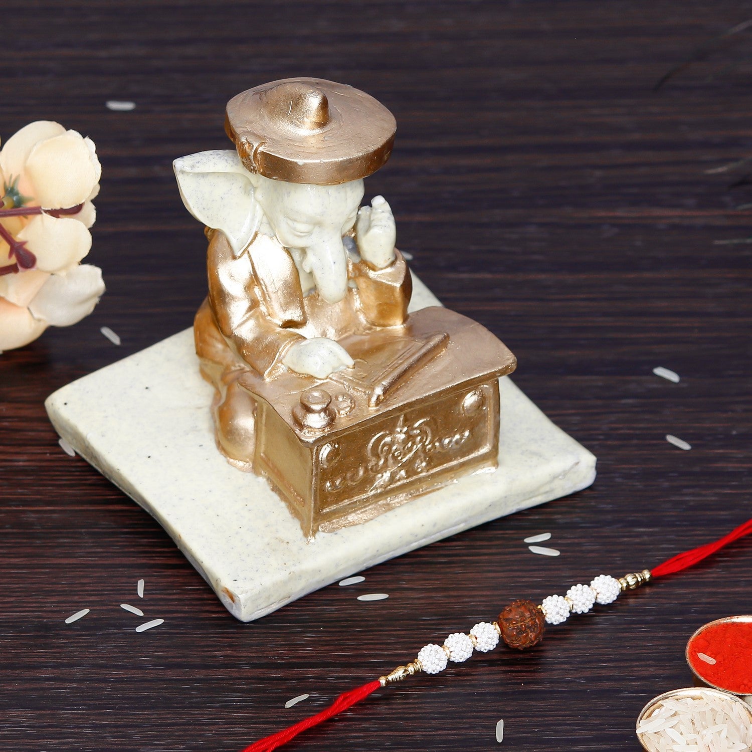 Rudraksh Rakhi with Handcrafted Ganesha Showpiece and Roli Chawal Pack