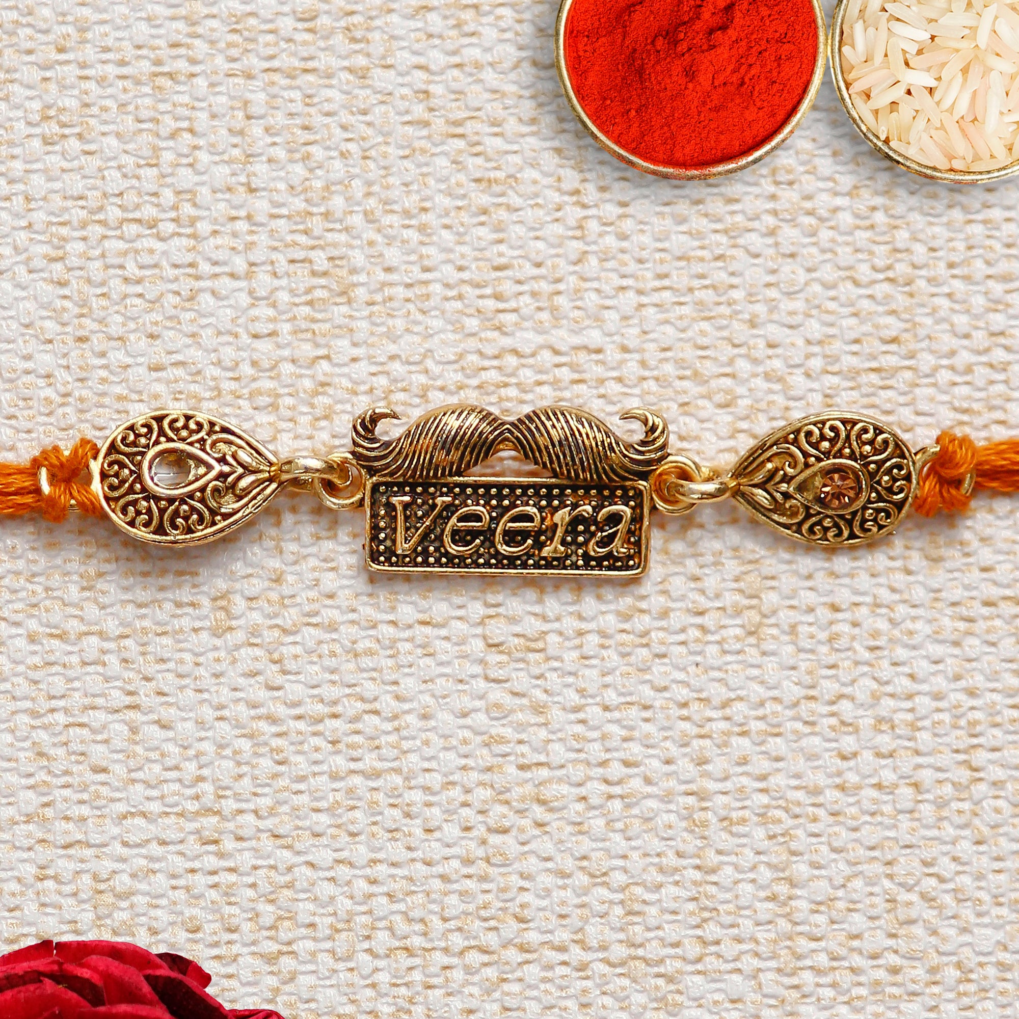 Designer Veera Rakhi with Lord Ganesha Idol on Decorative Handcrafted Green Floral Plate for Home and Car and Roli Chawal Pack 1