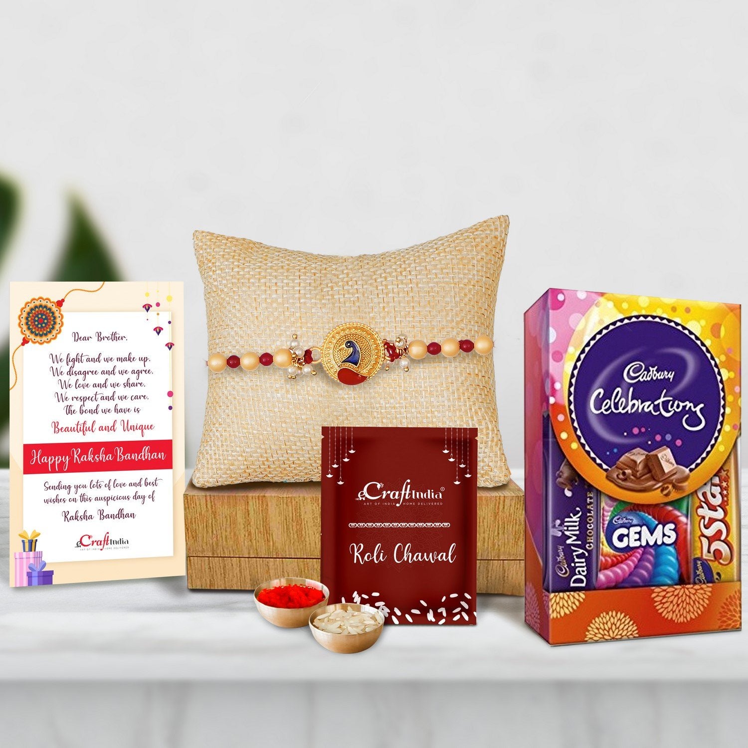Designer Peacock Rakhi with Cadbury Celebrations Gift Pack of 5 Assorted Chocolates and Roli Chawal Pack, Best Wishes Greeting Card