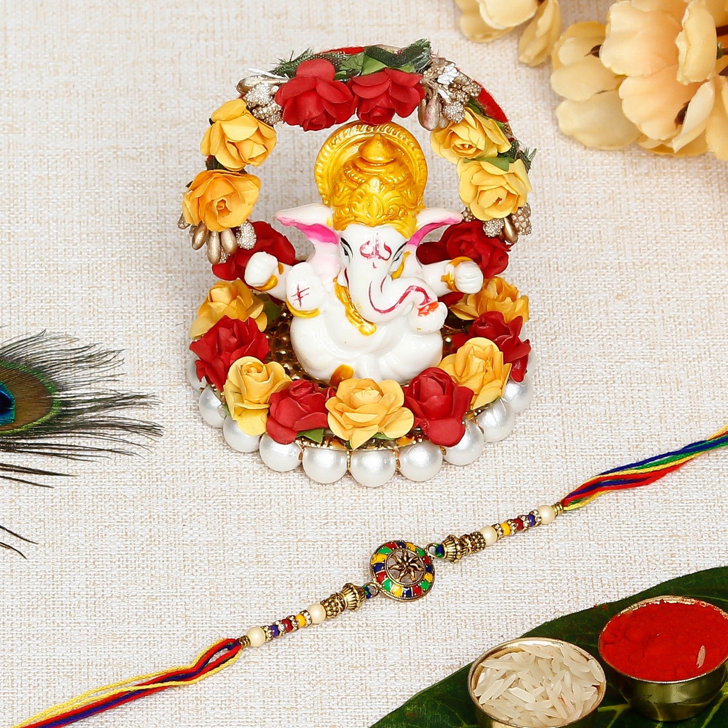 Designer Rakhi with Lord Ganesha Idol on Decorative Plate for Car & Home and Roli Chawal Pack