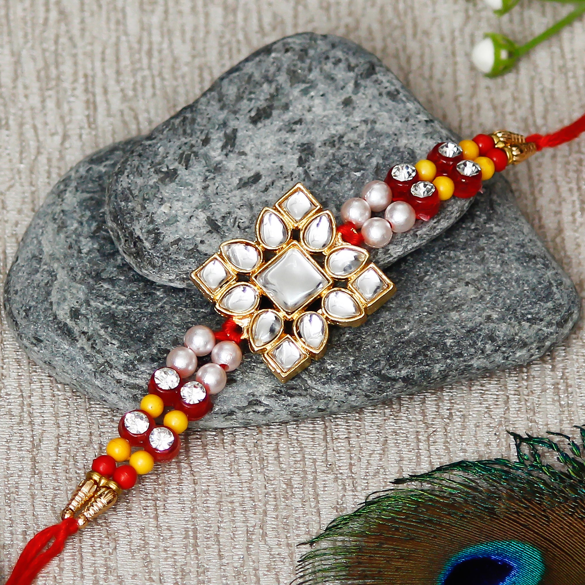 Designer Stone Work Rakhi with Lord Ganesha Idol on Decorative Handcrafted Plate for Home and Car and Roli Chawal Pack 1