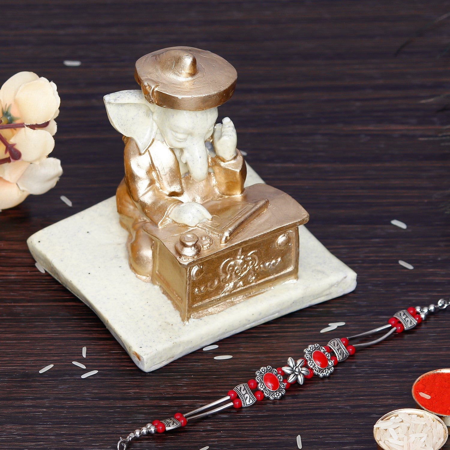 Designer Stone Rakhi with Handcrafted Ganesha Showpiece and Roli Chawal Pack