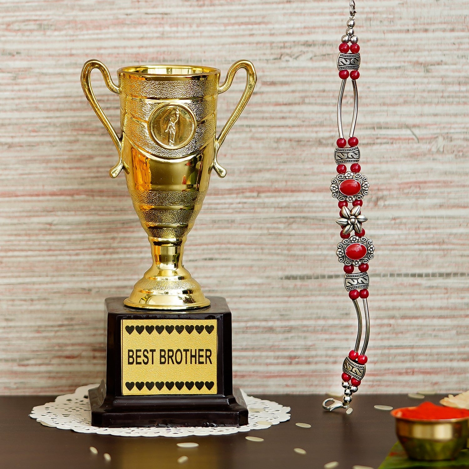 Designer Stone Rakhi with Best Brother Trophy and Roli Chawal Pack