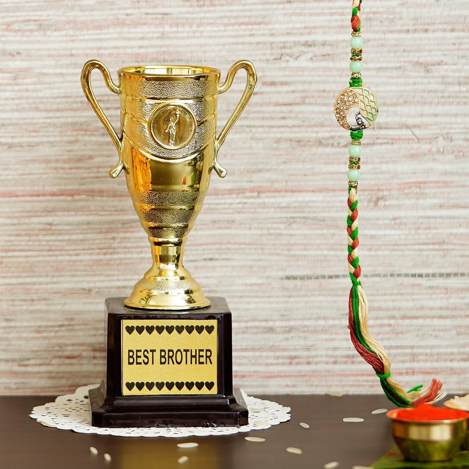 Designer Peacock Rakhi with Best Brother Trophy and Roli Chawal Pack