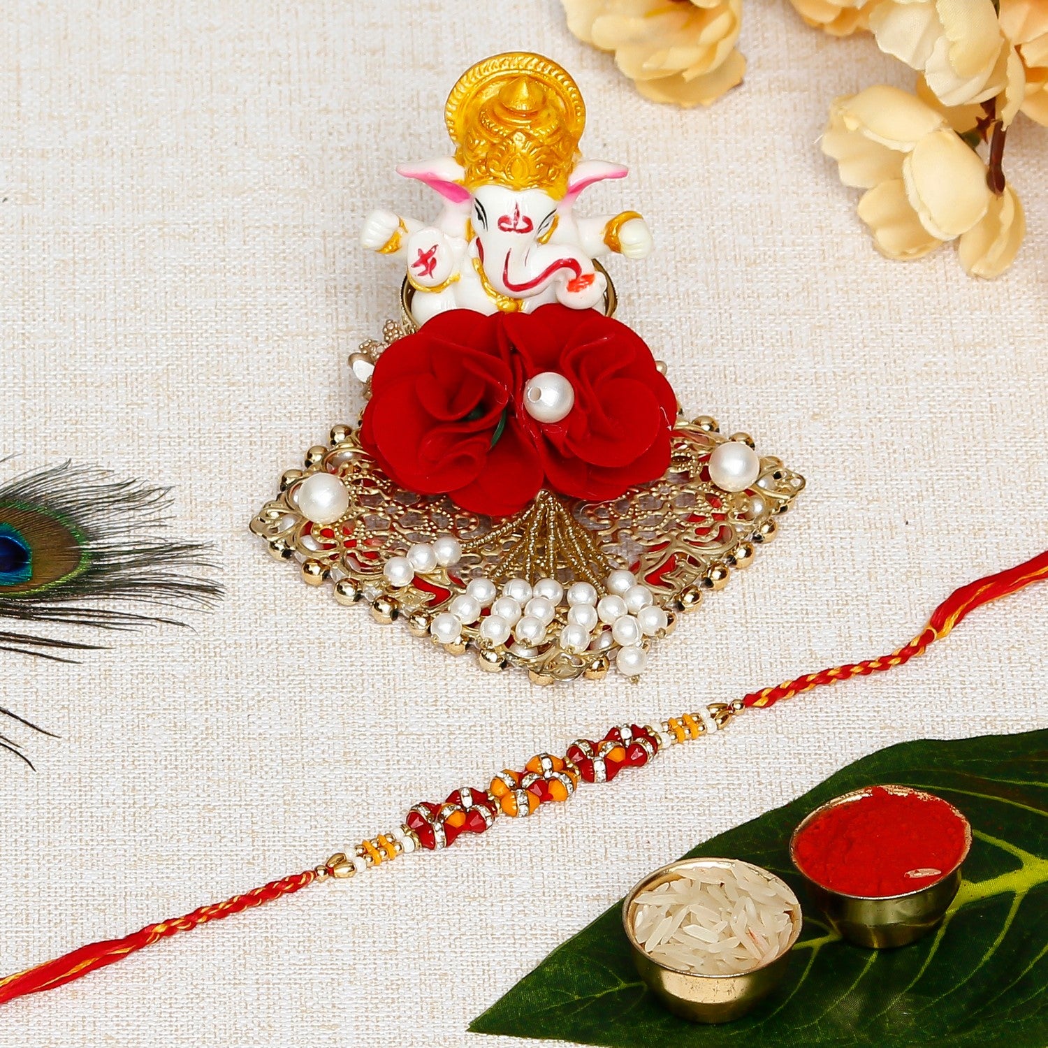 Designer Rakhi with Lord Ganesha Idol on Decorative Plate for Car & Home and Roli Chawal Pack