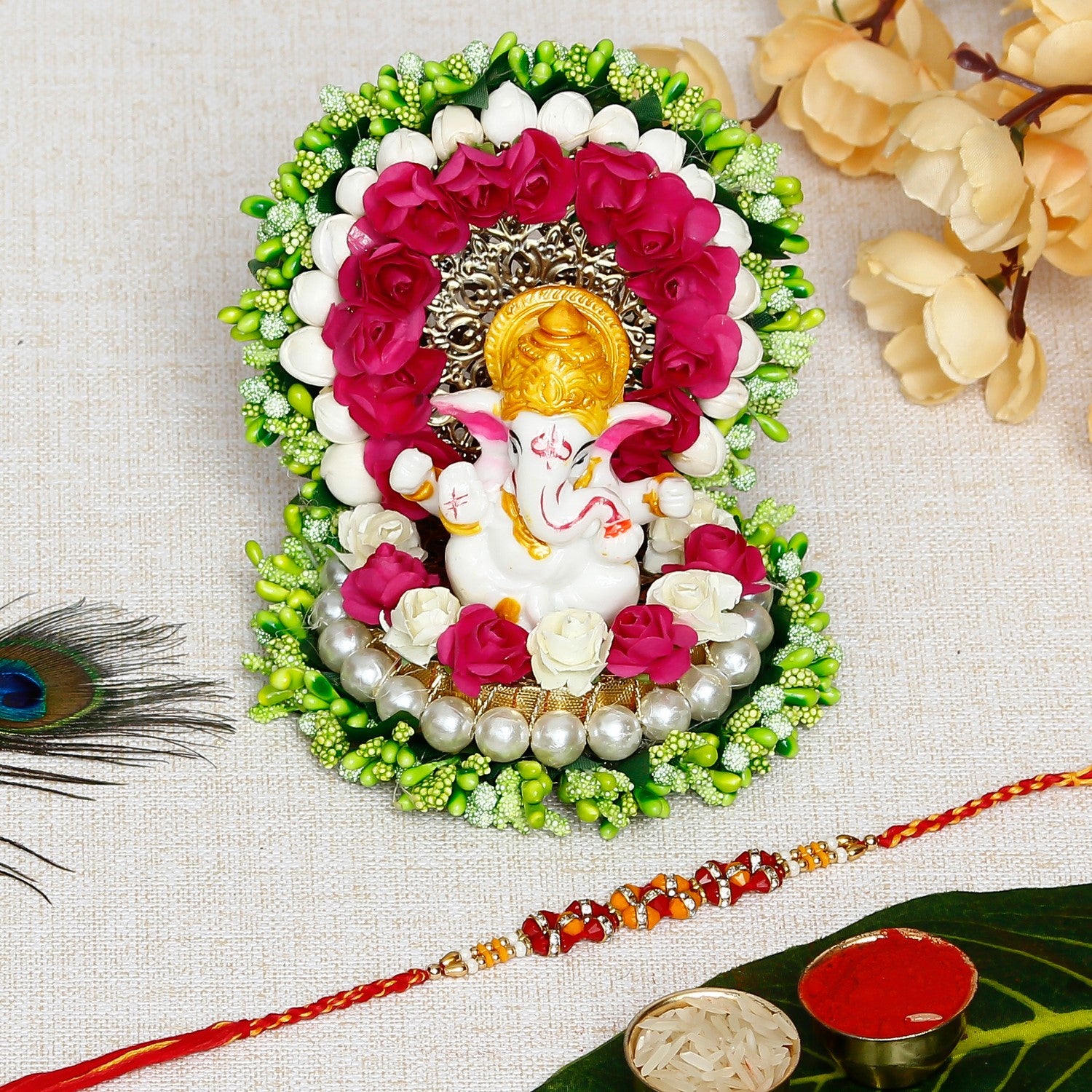 Designer Rakhi with Lord Ganesha Idol on Decorative Handcrafted Green Floral Plate for Home and Car and Roli Chawal Pack