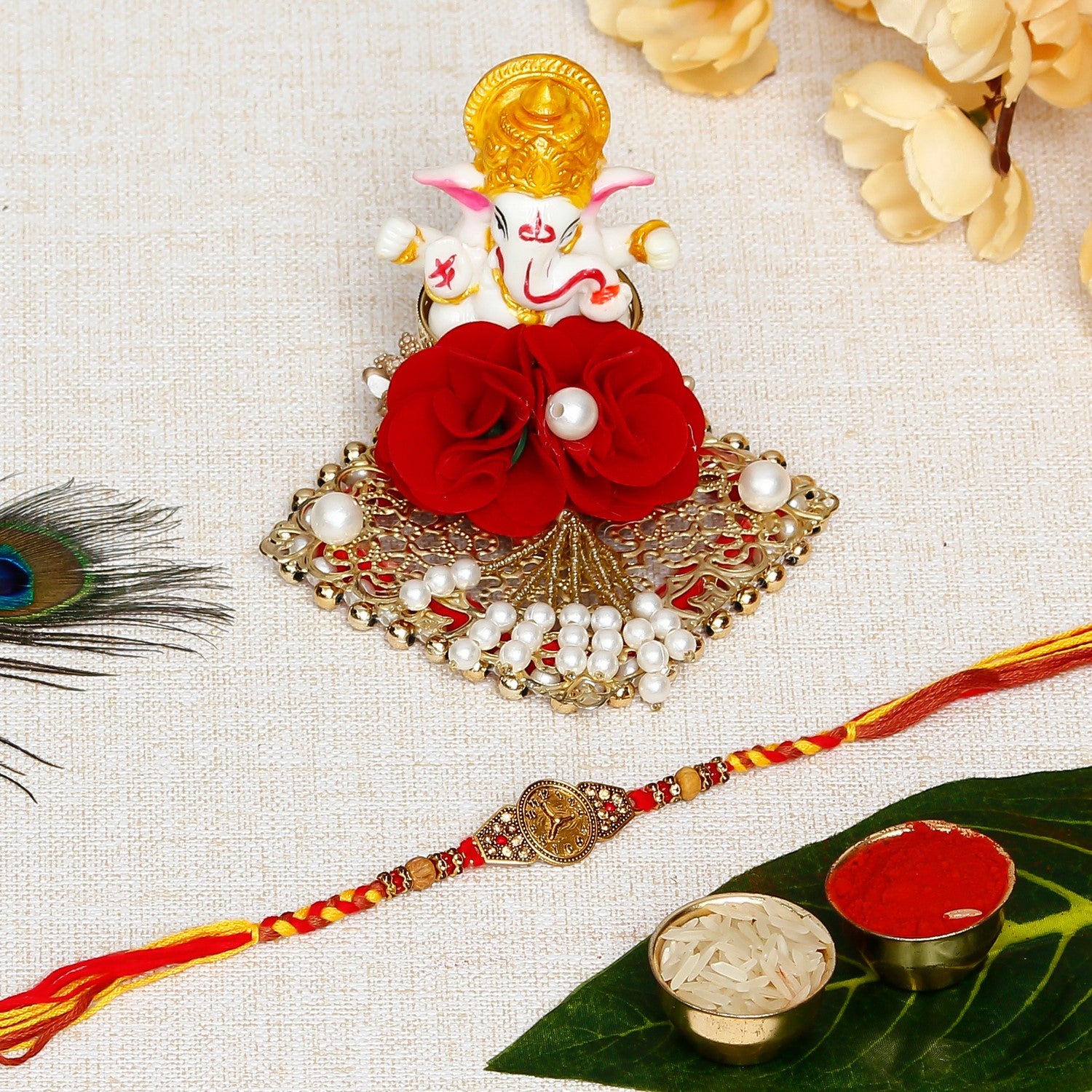 Designer Watch Pattern Rakhi with Lord Ganesha Idol on Decorative Plate for Car & Home and Roli Chawal Pack