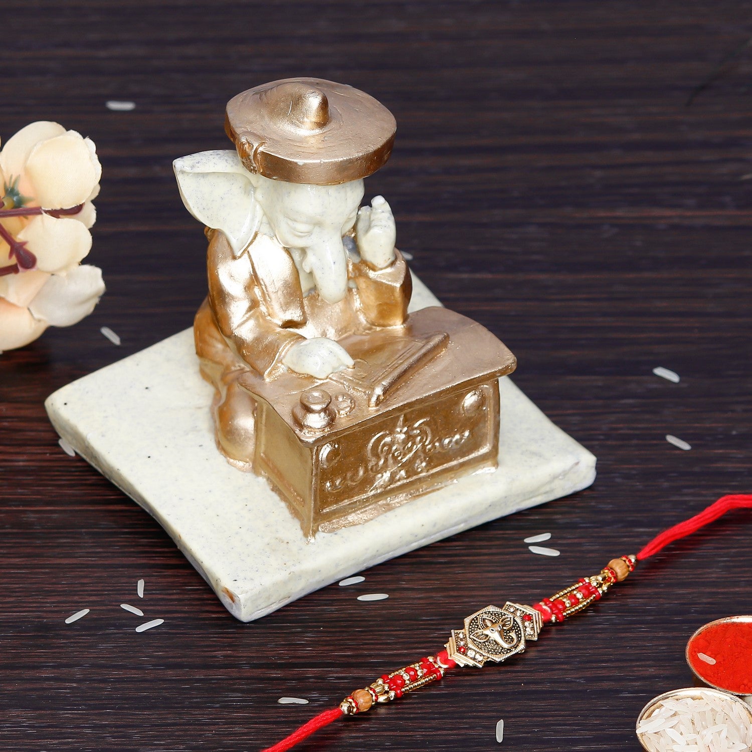 Designer Ganesha Rakhi with Handcrafted Ganesha Showpiece and Roli Chawal Pack