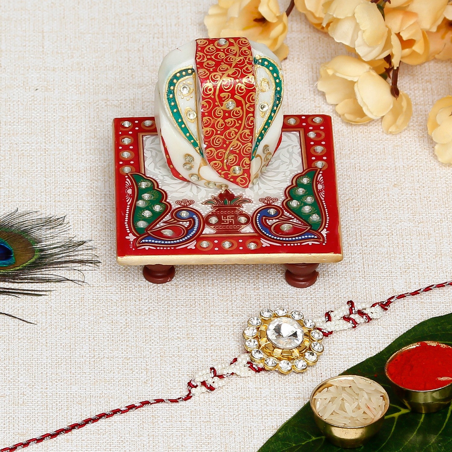 Designer  Handcrafted Rakhi with Lord Ganesha on Marble Chowki and Roli Chawal Pack
