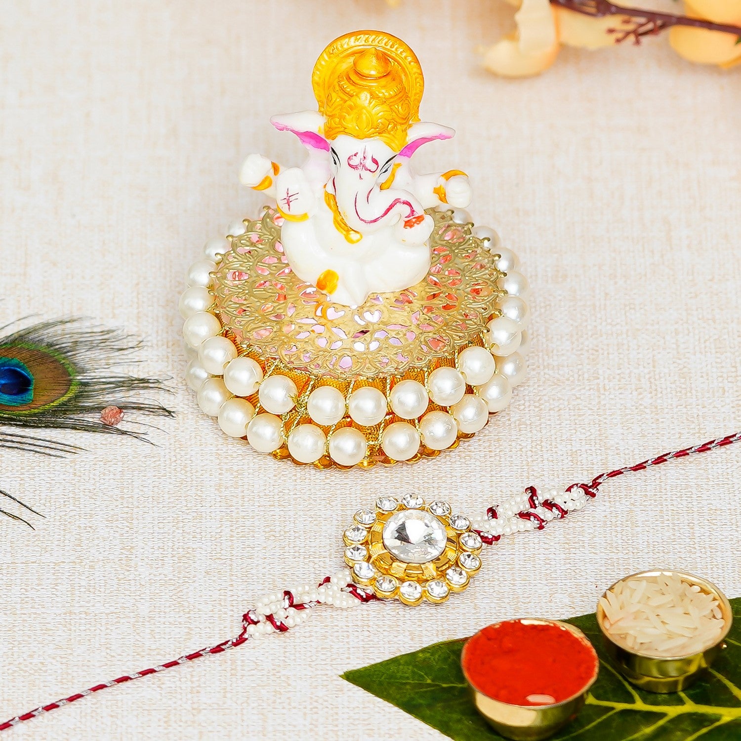 Designer  Handcrafted Rakhi with Lord Ganesha Idol on Decorative Handcrafted Plate for Home and Car and Roli Chawal Pack