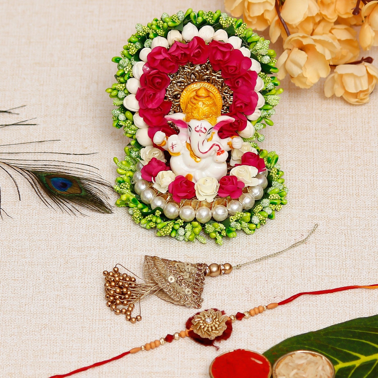Designer Handcrafted Premium Bhaiya Bhabhi Rakhi with Lord Ganesha Idol on Decorative Handcrafted Green Floral Plate for Home and Car and Roli Chawal Pack