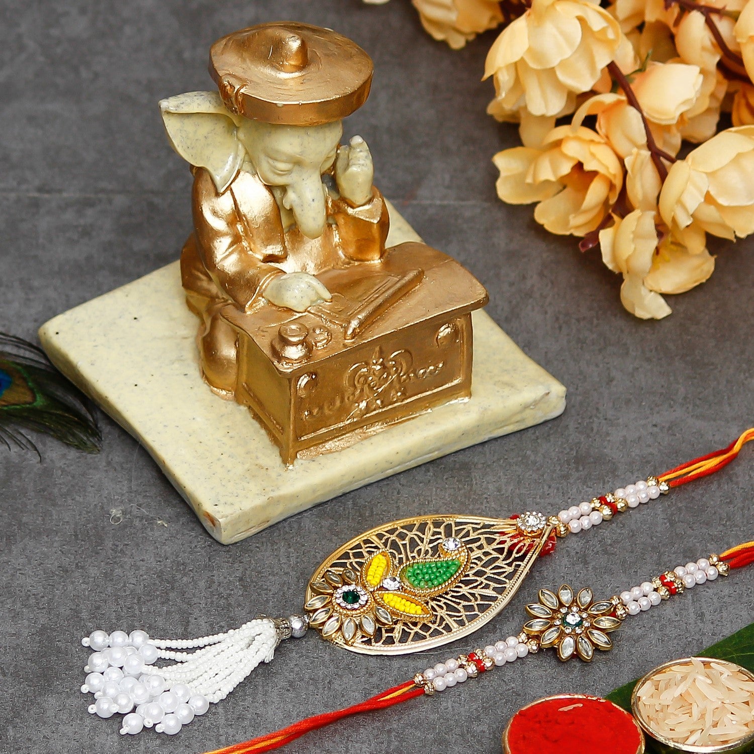 Designer Handcrafted Premium Bhaiya Bhabhi Rakhi with Handcrafted Ganesha Showpiece and Roli Chawal Pack