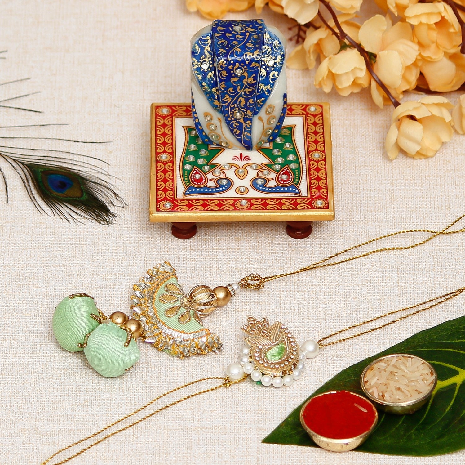 Designer Handcrafted Premium Bhaiya Bhabhi Rakhi with Lord Ganesha on Marble Chowki and Roli Chawal Pack