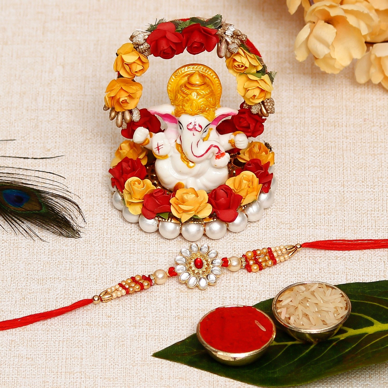 Desginer Rakhi with Lord Ganesha Idol on Decorative Plate for Car & Home and Roli Chawal Pack