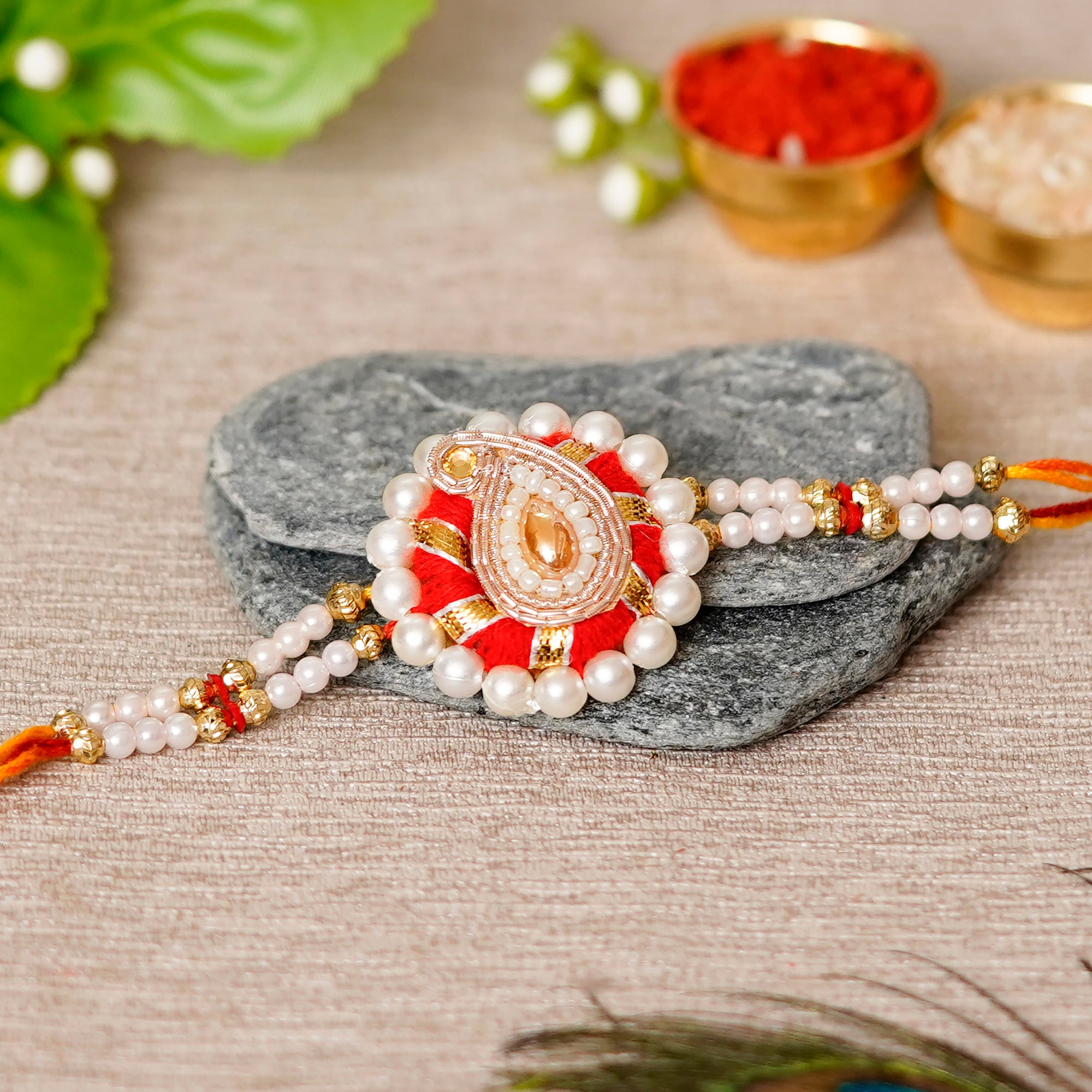Designer Handcrafted Rakhi with Handcrafted Ganesha Showpiece and Roli ...