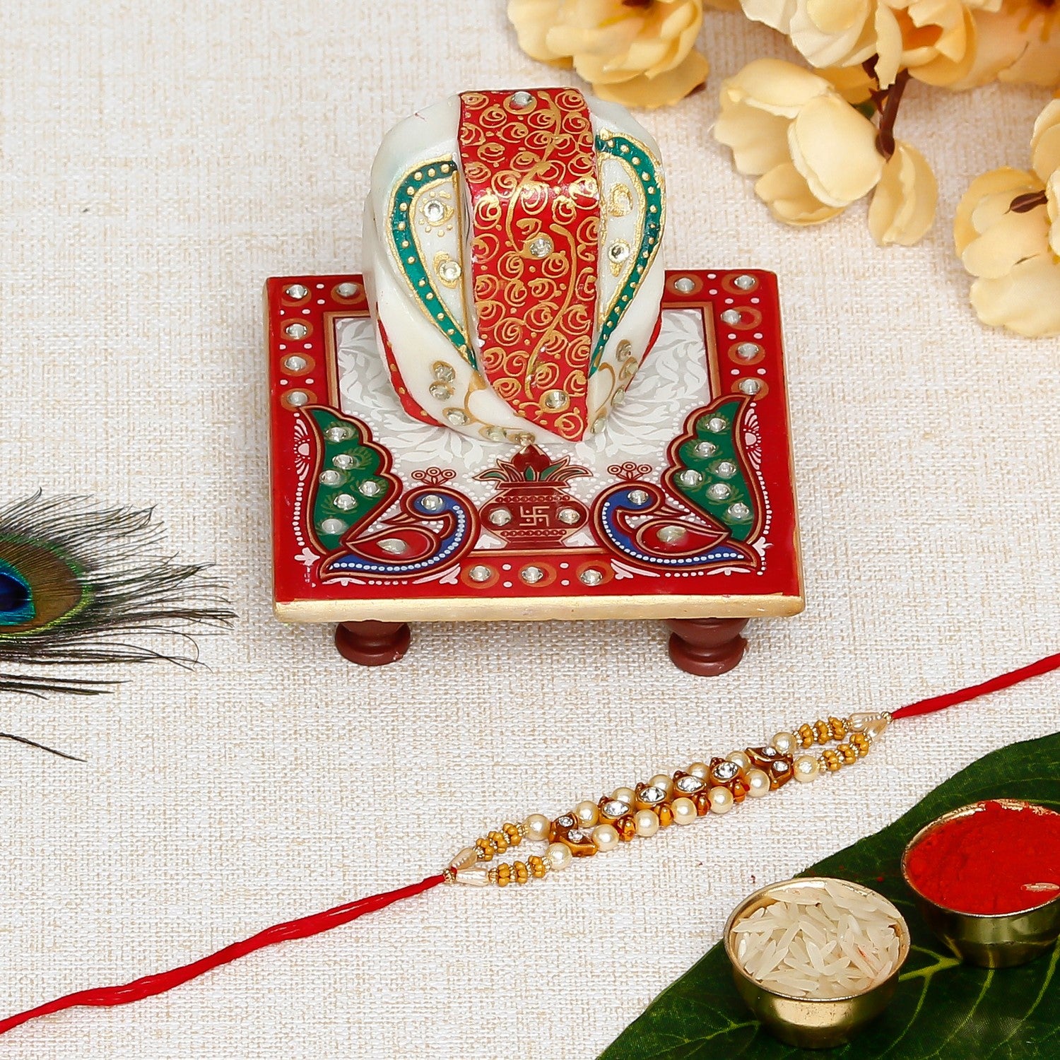 Designer Handcrafted Rakhi with Lord Ganesha on Marble Chowki and Roli Chawal Pack