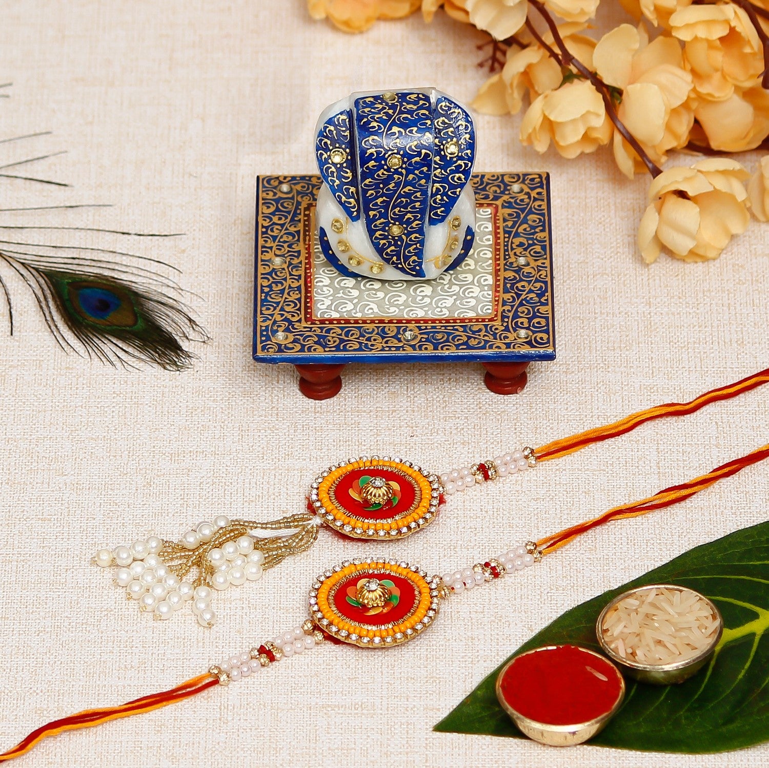 Designer Handcrafted Premium Bhaiya Bhabhi Rakhi with Lord Ganesha Marble Chowki and Roli Chawal Pack