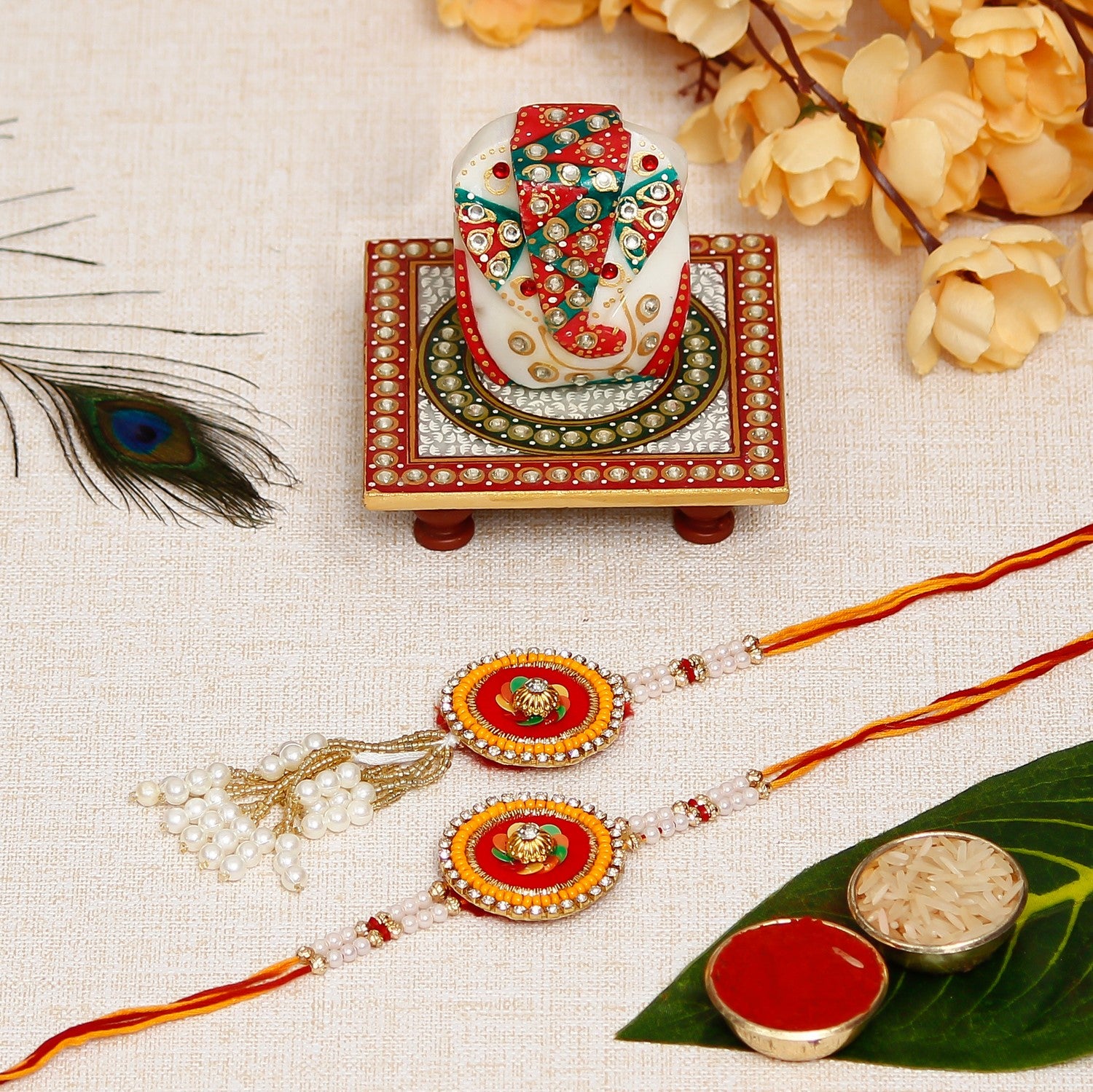 Designer Handcrafted Premium Bhaiya Bhabhi Rakhi with Lord Ganesha on Kundan Studded Marble Chowki and Roli Chawal Pack