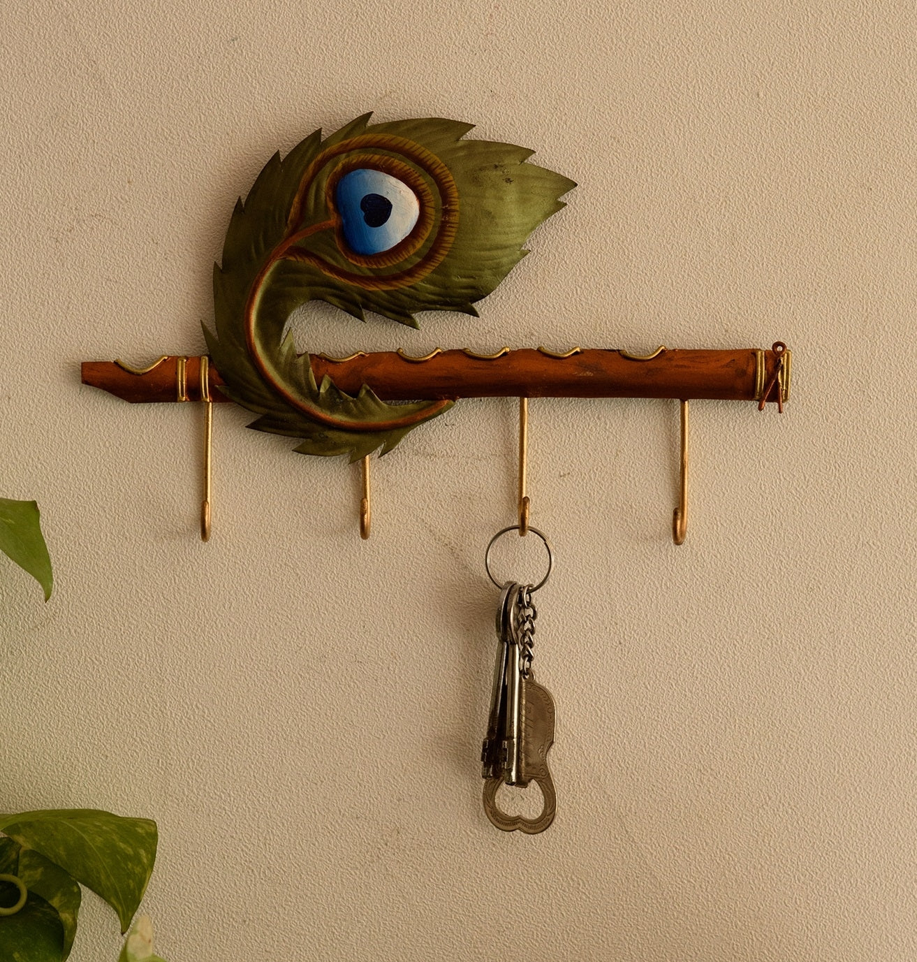 Wrought Iron basuri with mor pankh
Key Holder (Green and Brown)
