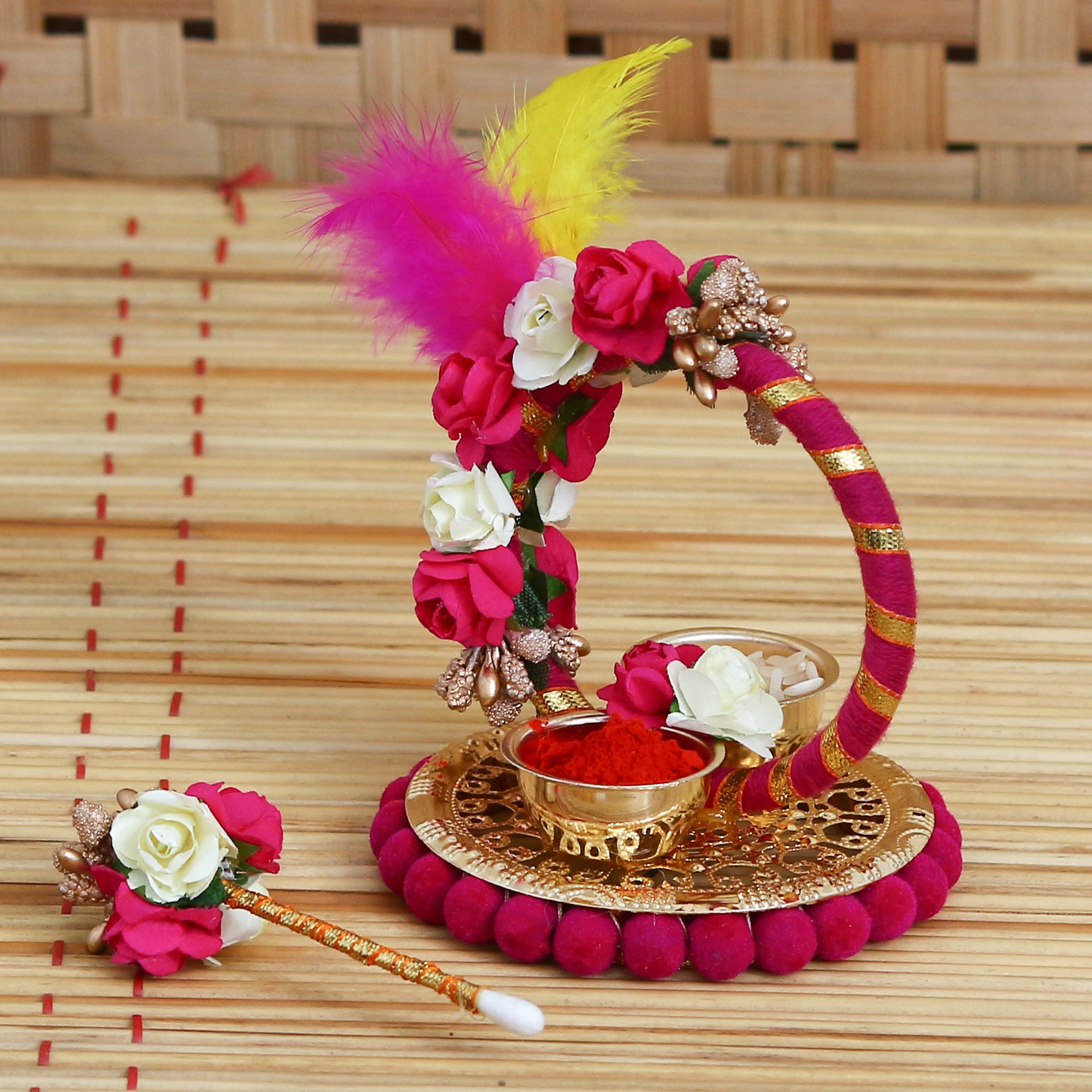 Multicolor Handcrafted Decorative Roli tikka holder with a designer stick and Colorful Feathers